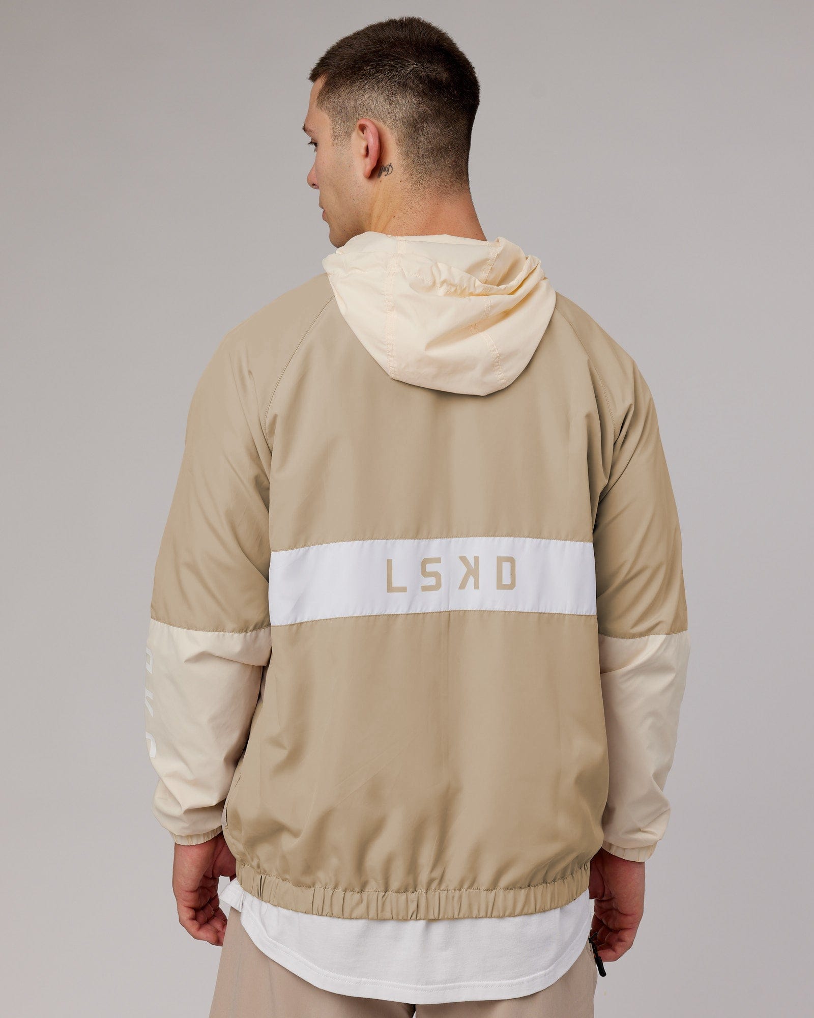 Model wearing Trackside Jacket - Light Fawn