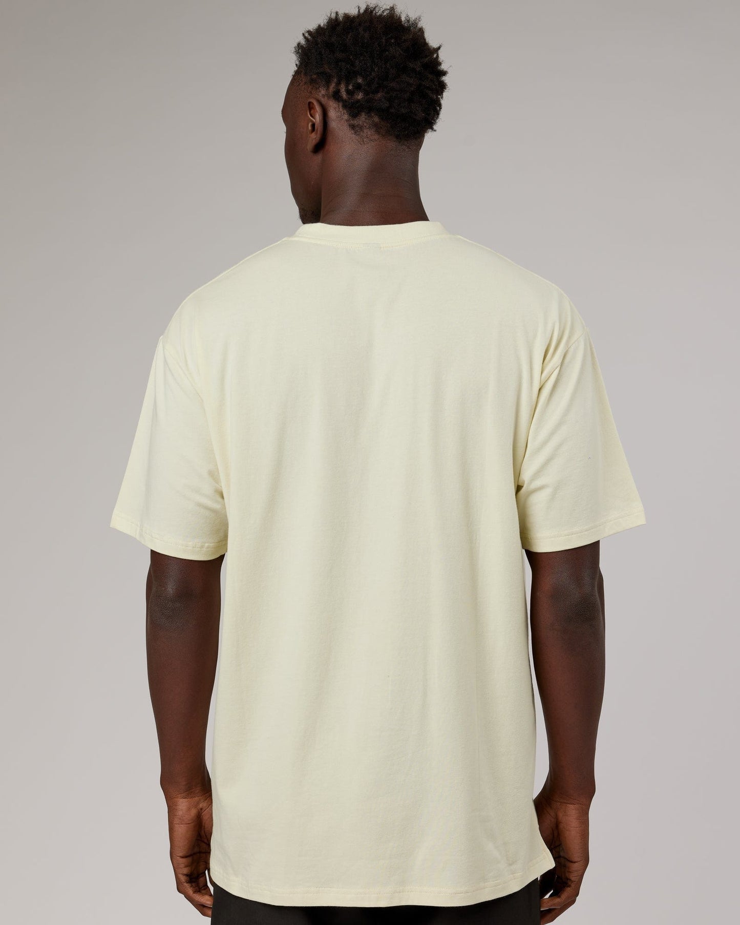 Model wearing Upright FLXCotton Tee Oversize - Almond Milk
