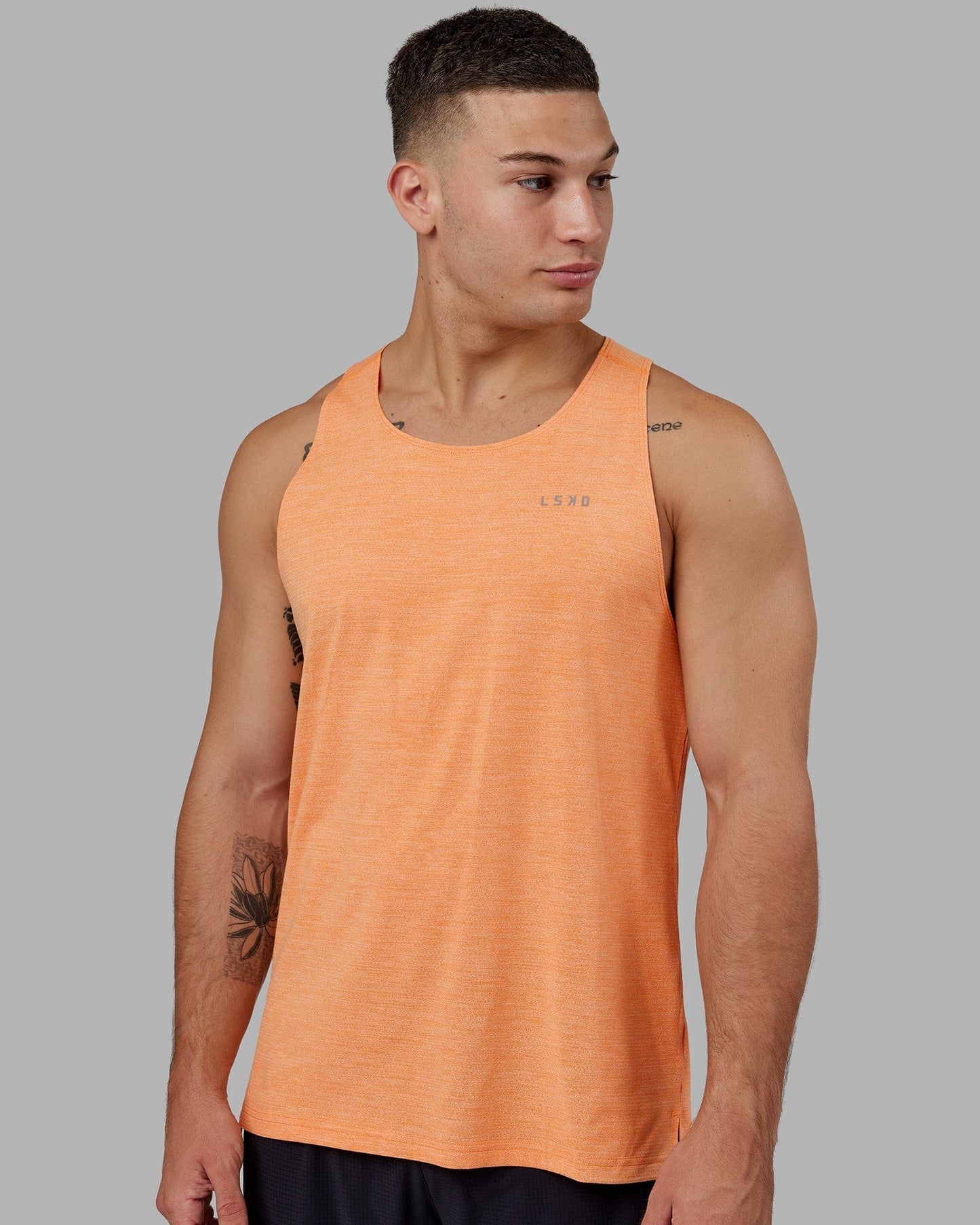 Model wearing Perform VapourFLX Tank - Tangerine Marl