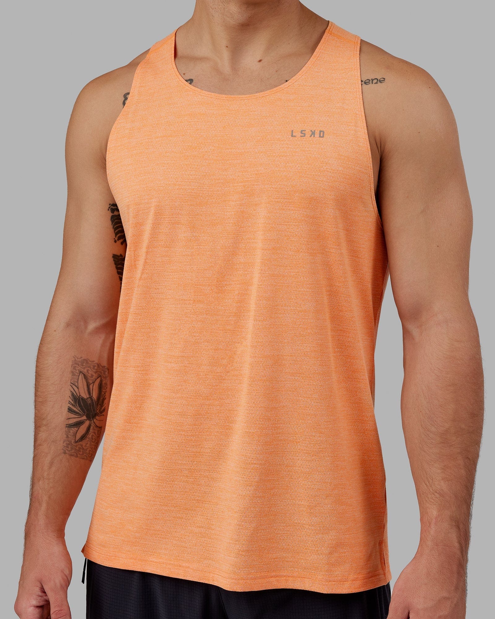 Model wearing Perform VapourFLX Tank - Tangerine Marl