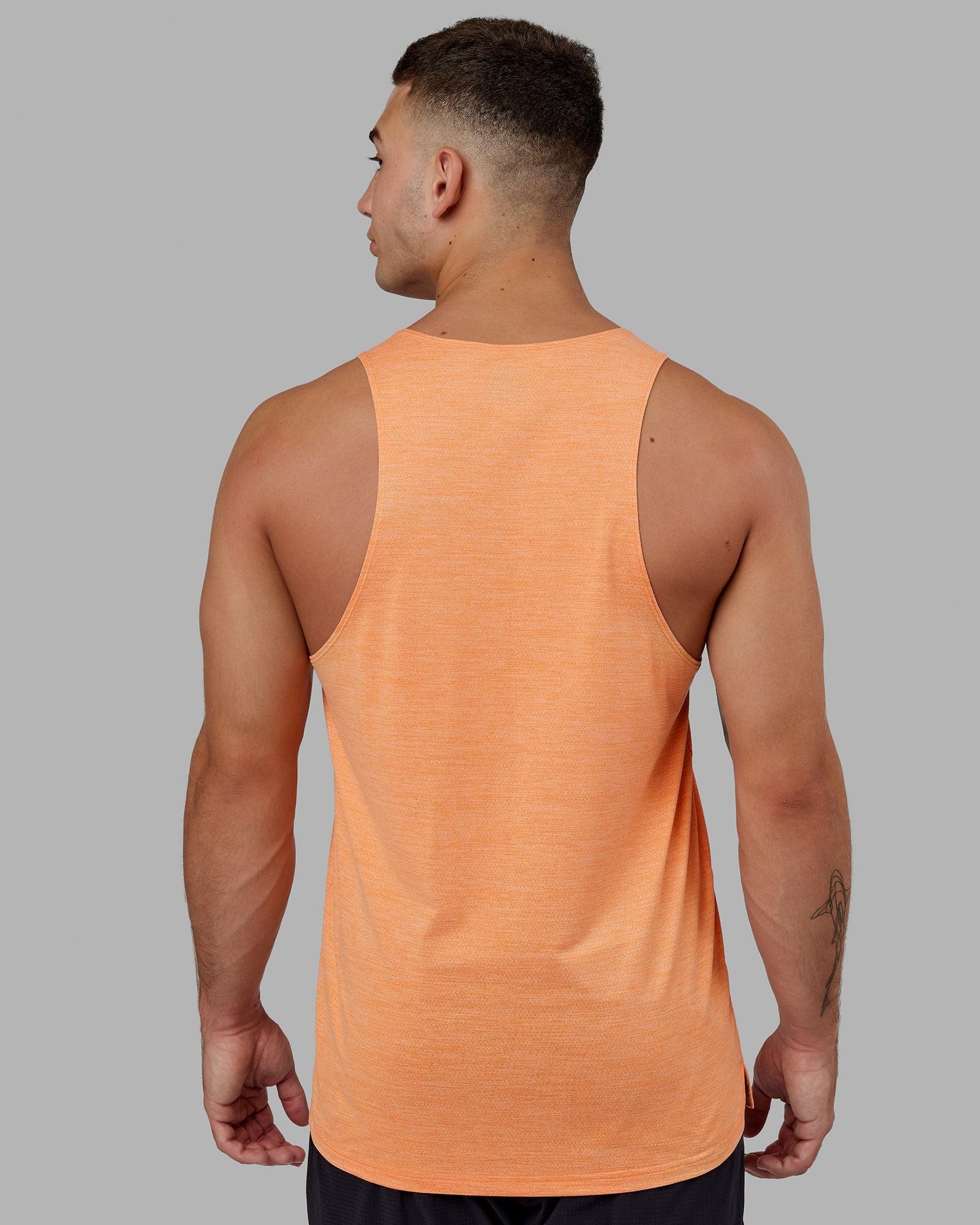 Model wearing Perform VapourFLX Tank - Tangerine Marl