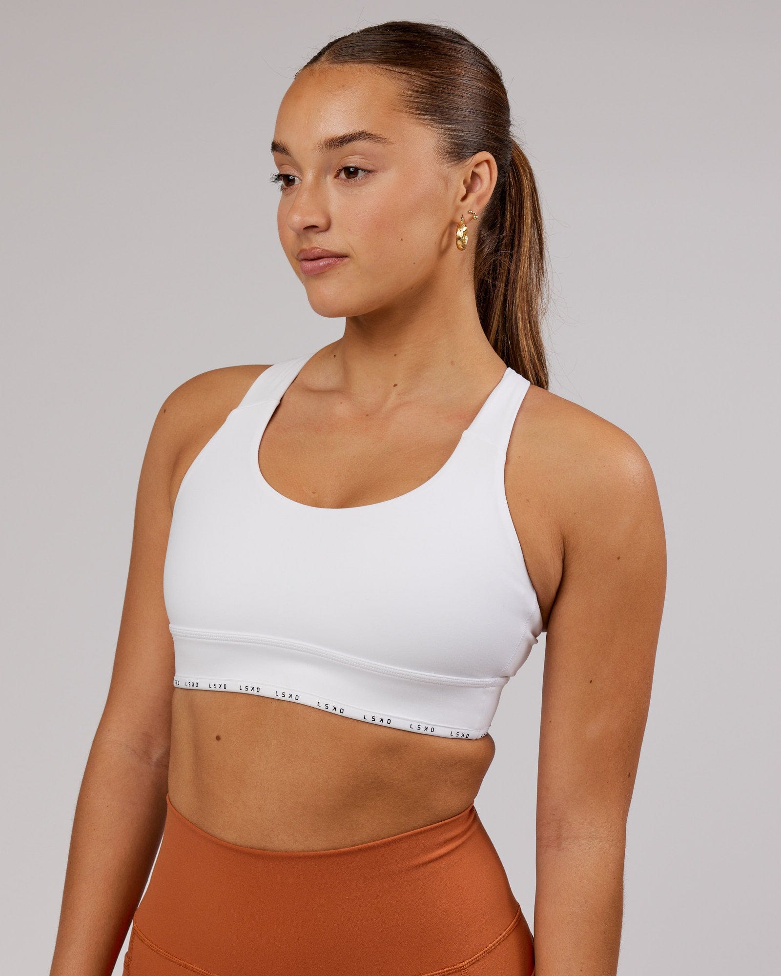 Model wearing MVP Sports Bra - White