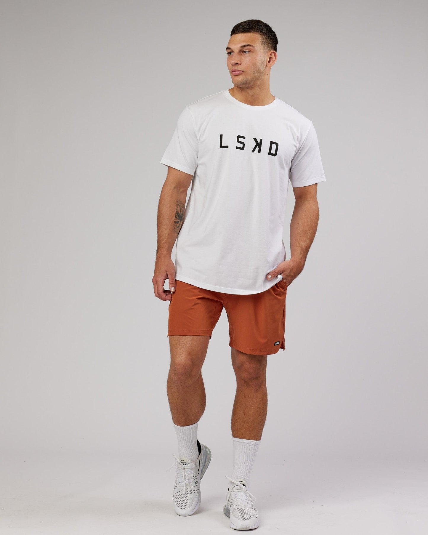 Model wearing Power FLXDRY Performance Tee - White-Black