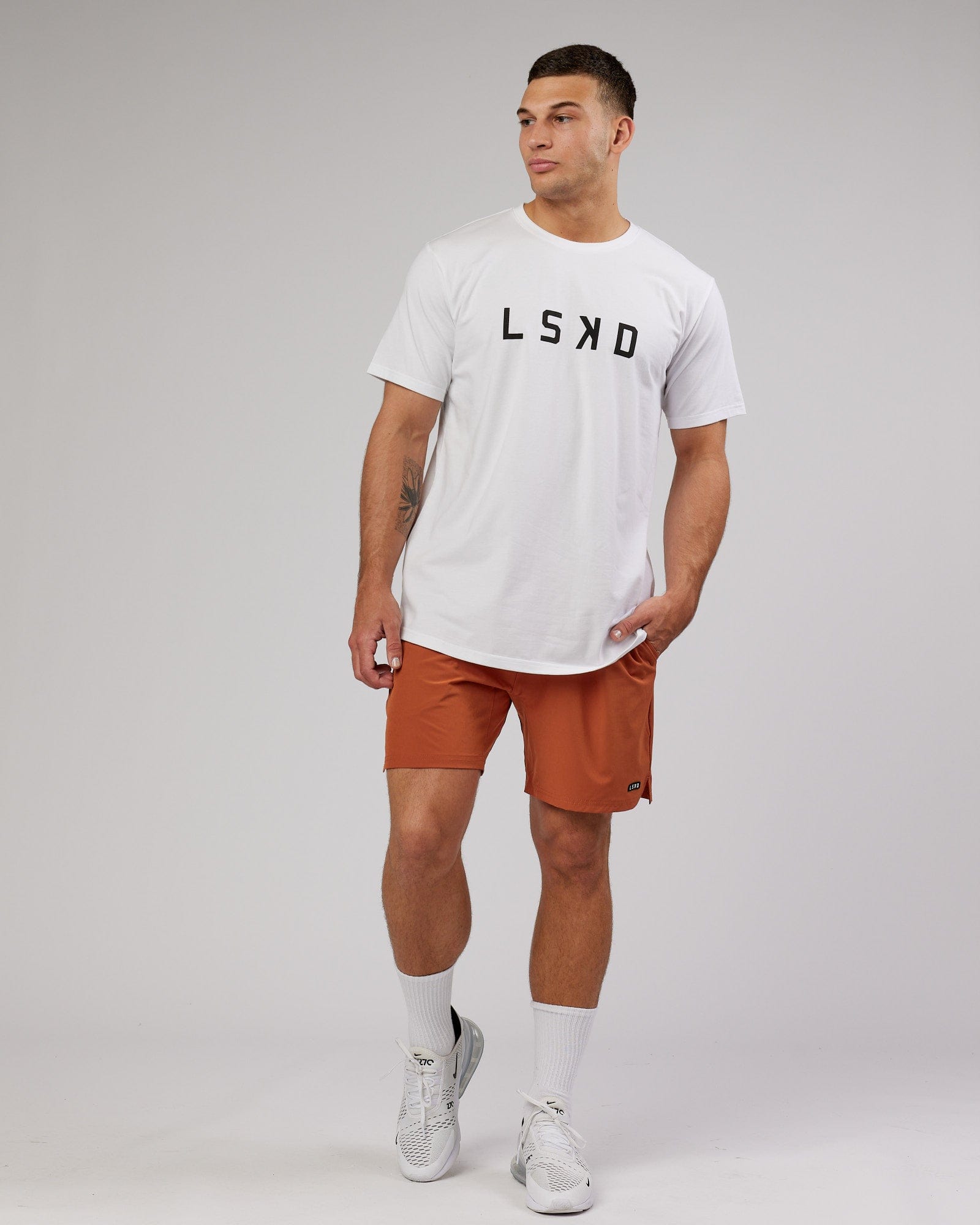 Model wearing Power FLXDRY Performance Tee - White-Black