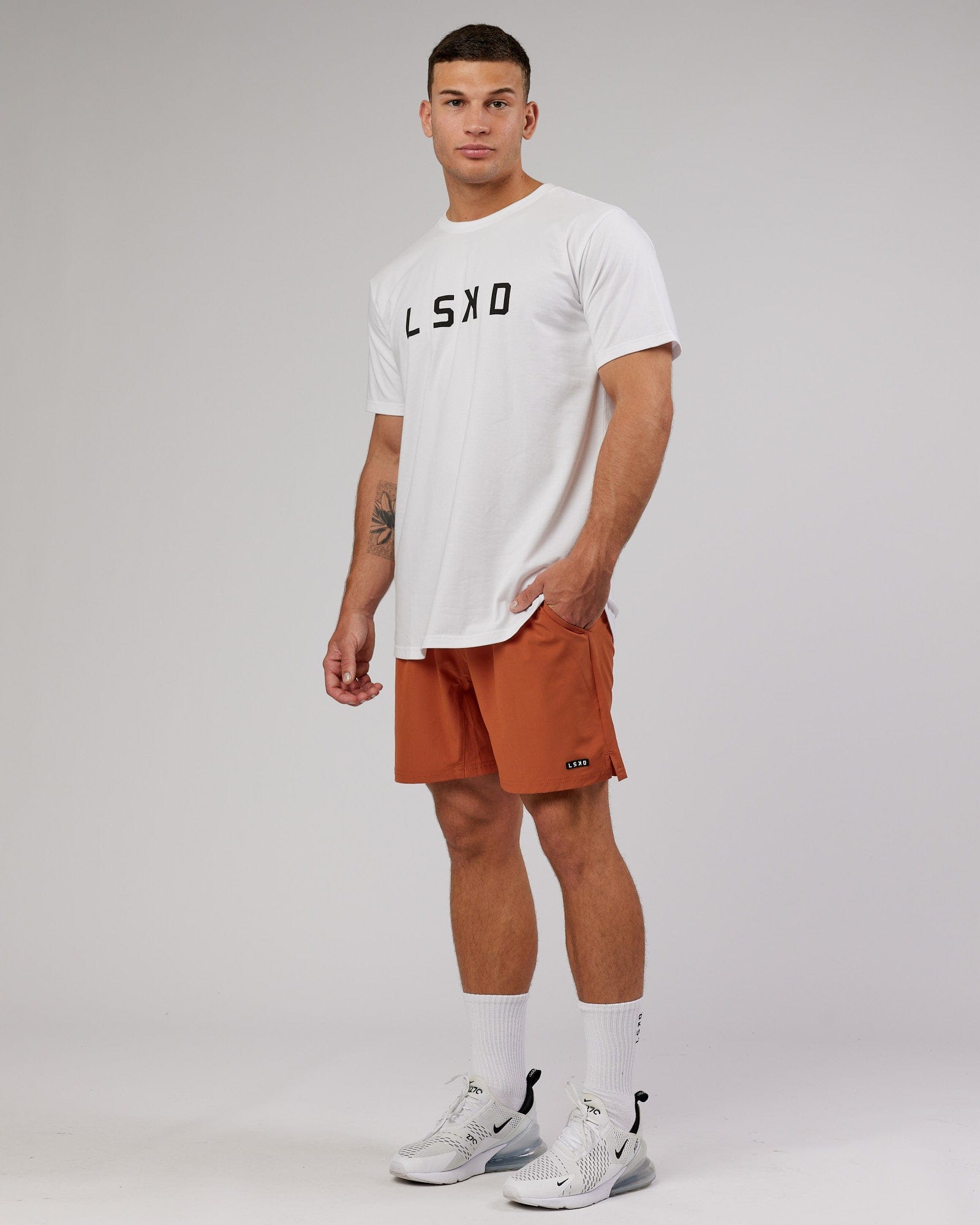 Model wearing Power FLXDRY Performance Tee - White-Black