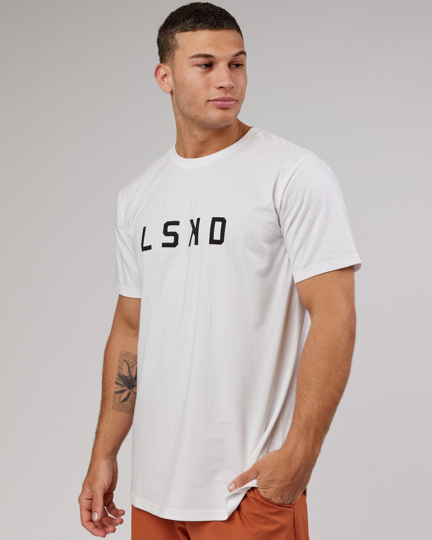 Model wearing Power FLXDRY Performance Tee - White-Black