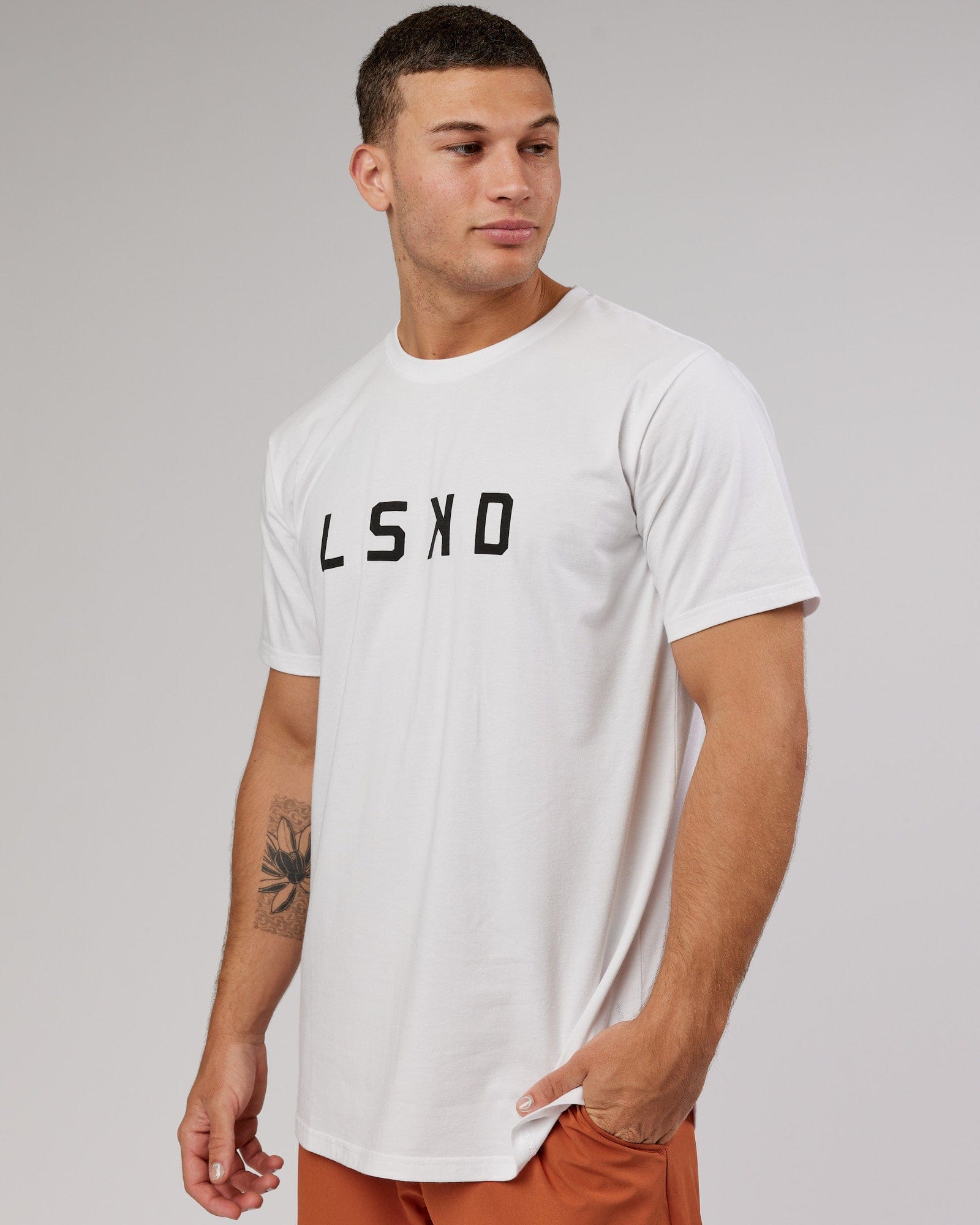 Model wearing Power FLXDRY Performance Tee - White-Black