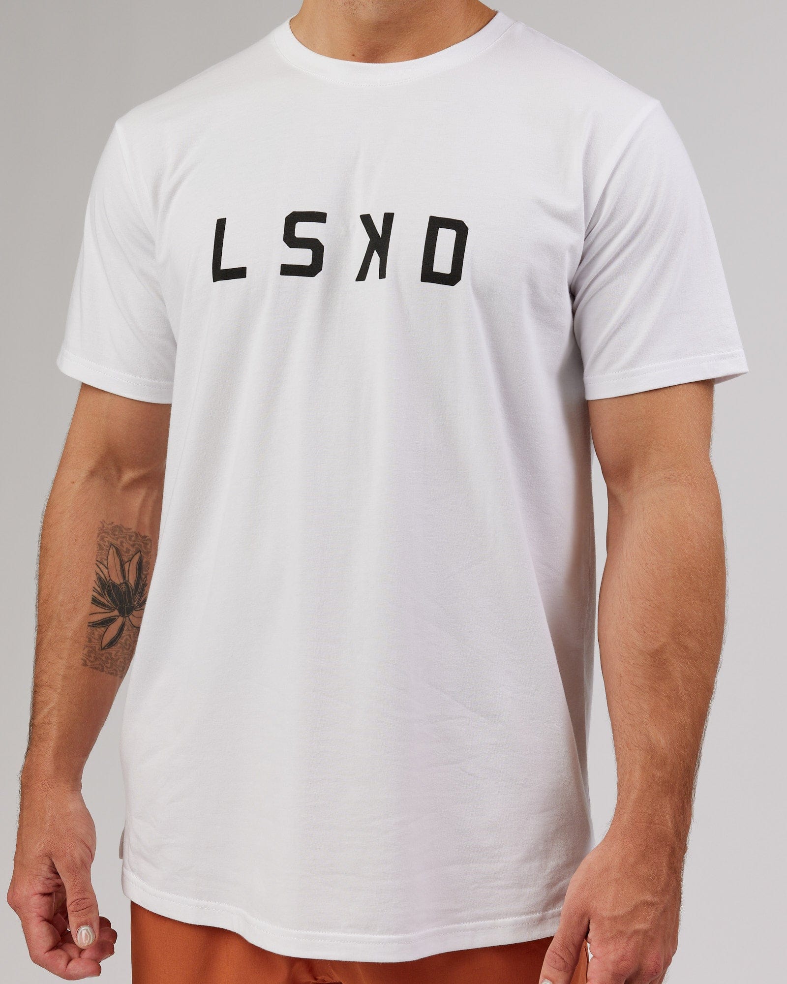 Model wearing Power FLXDRY Performance Tee - White-Black