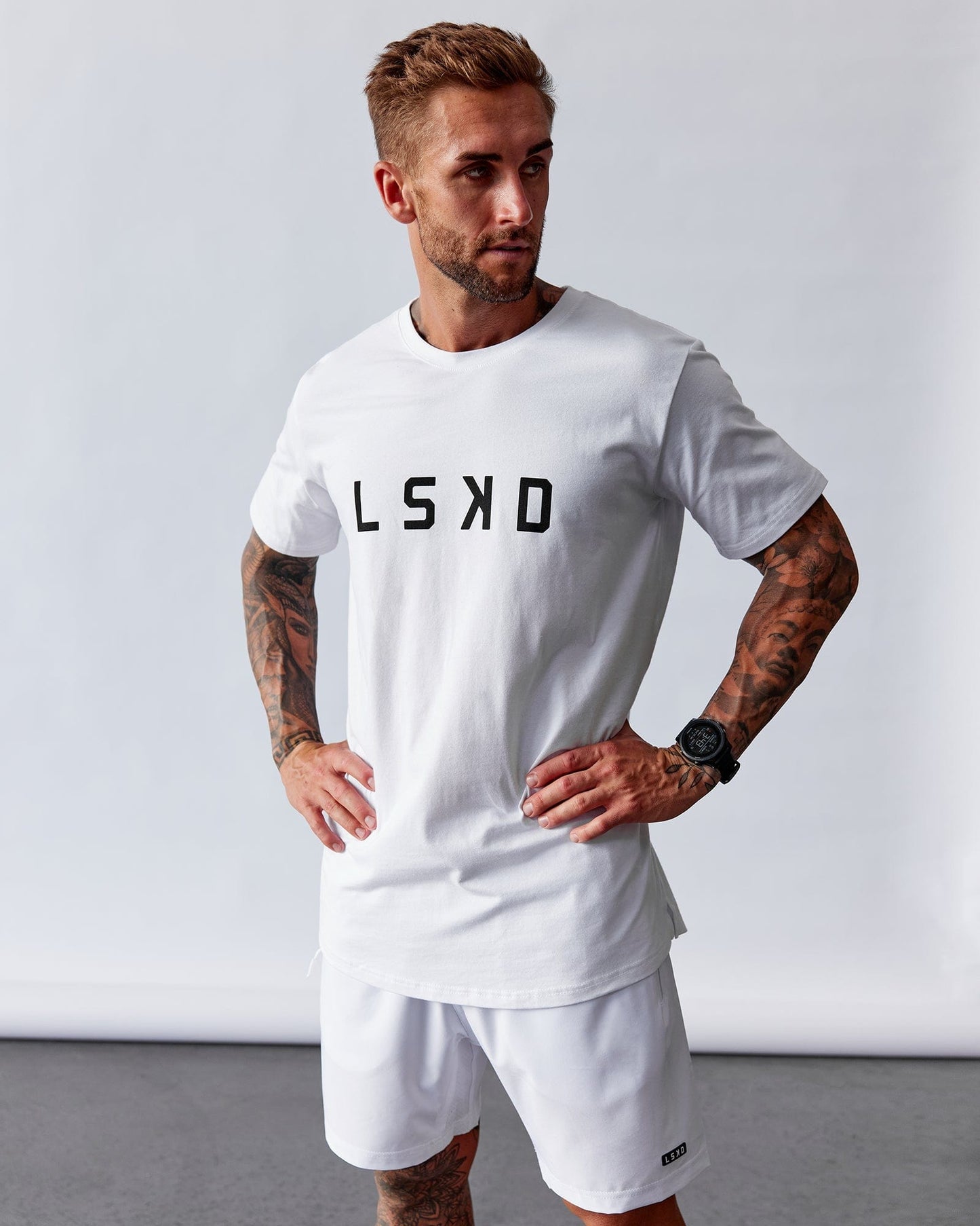 Model wearing Power FLXDRY Performance Tee - White-Black