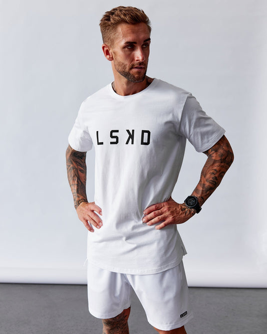 Model wearing Power FLXDRY Performance Tee - White-Black
