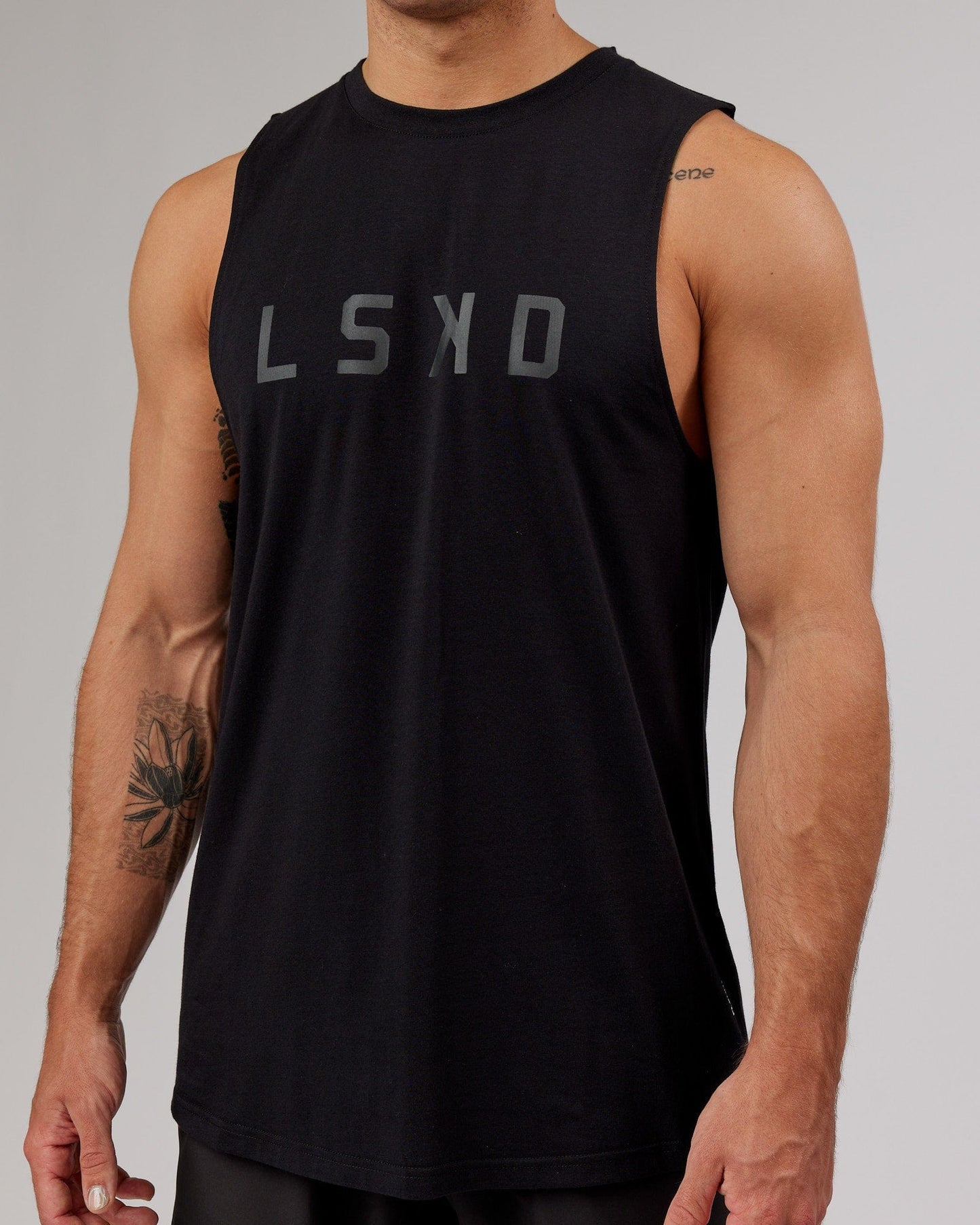 Model wearing Power FLXDRY Training Fit Performance Tank - Black-Black