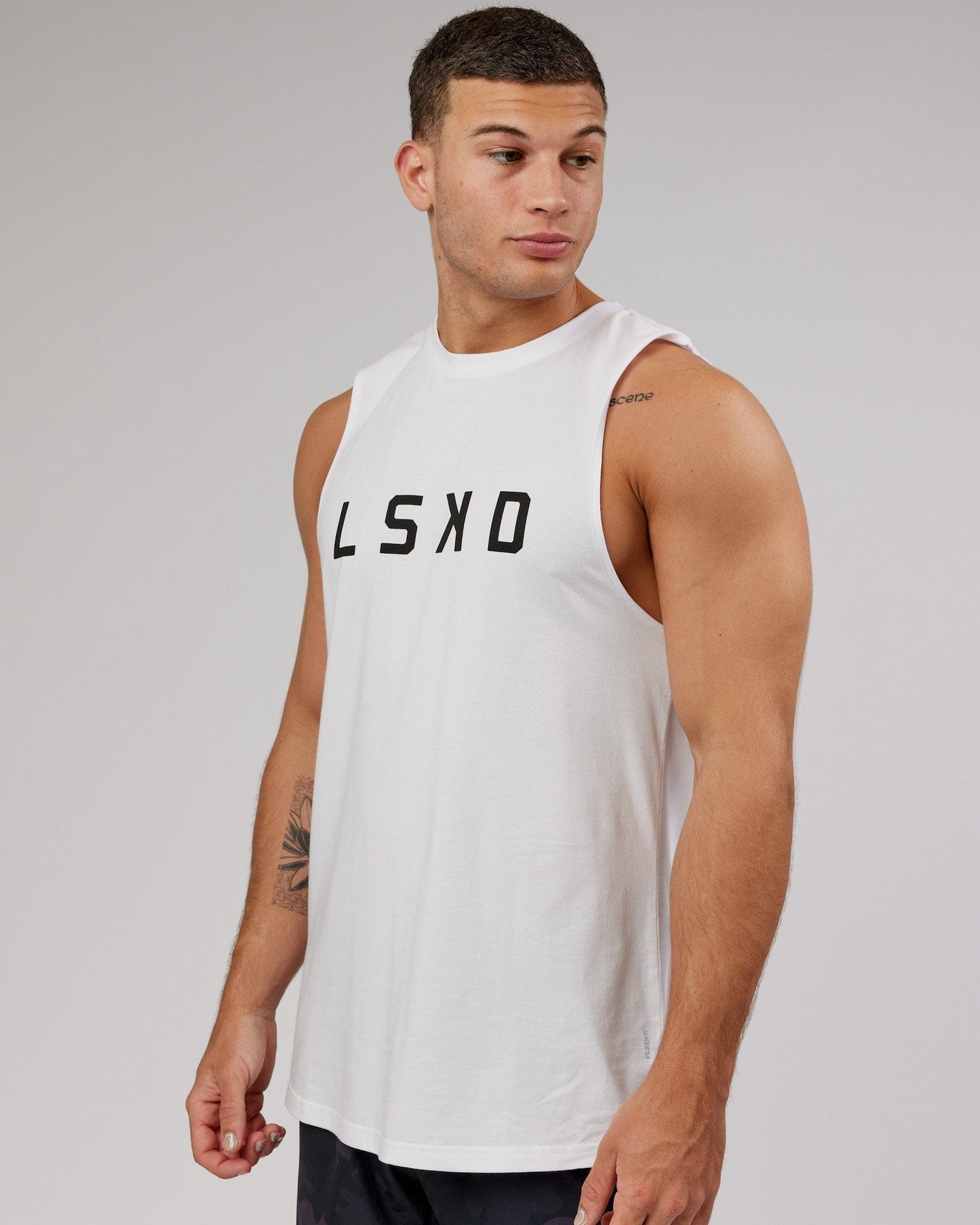 Model wearing Power FLXDRY Training Fit Training Fit Tank - White-Black