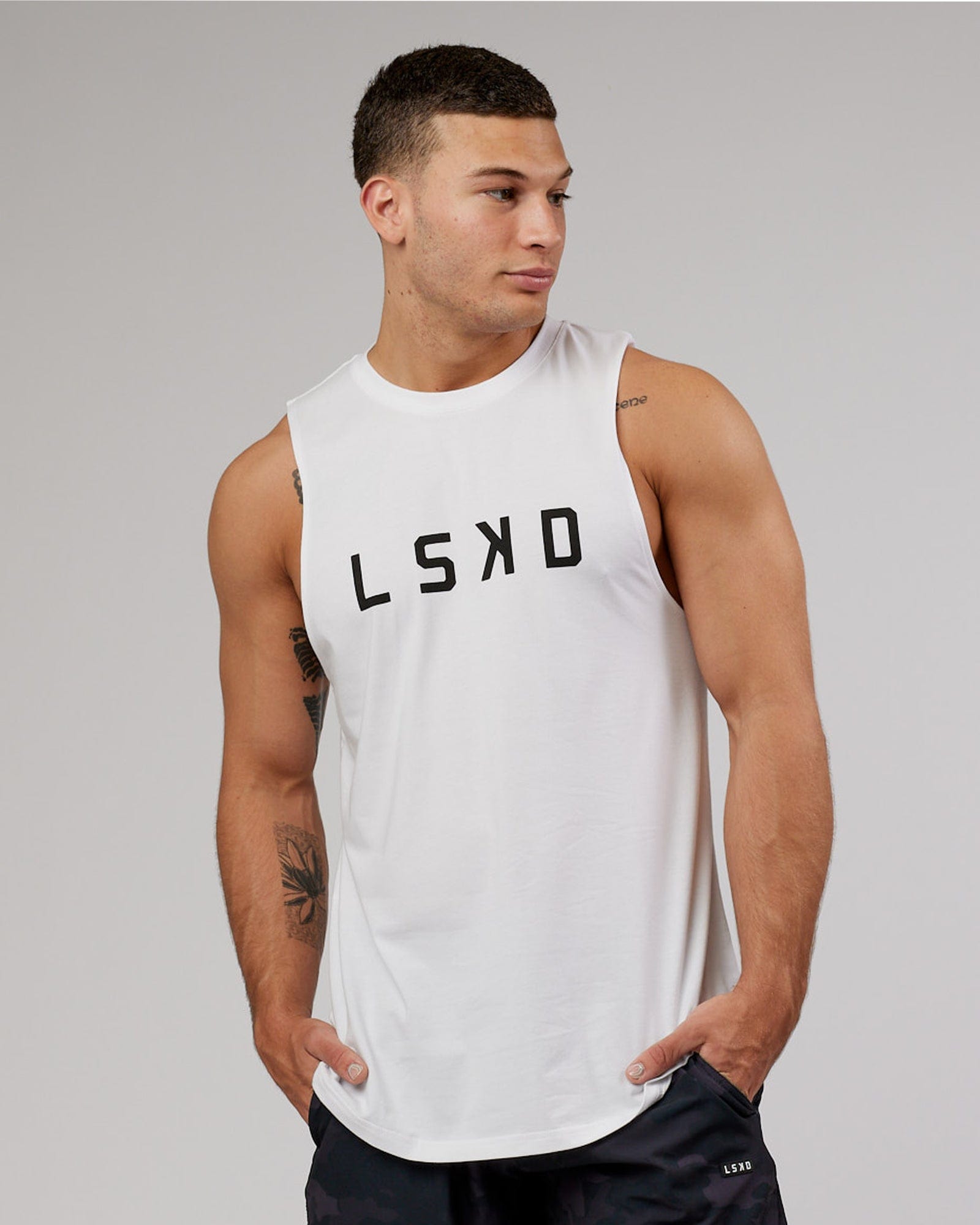 Model wearing Power FLXDRY Training Fit Training Fit Tank - White-Black