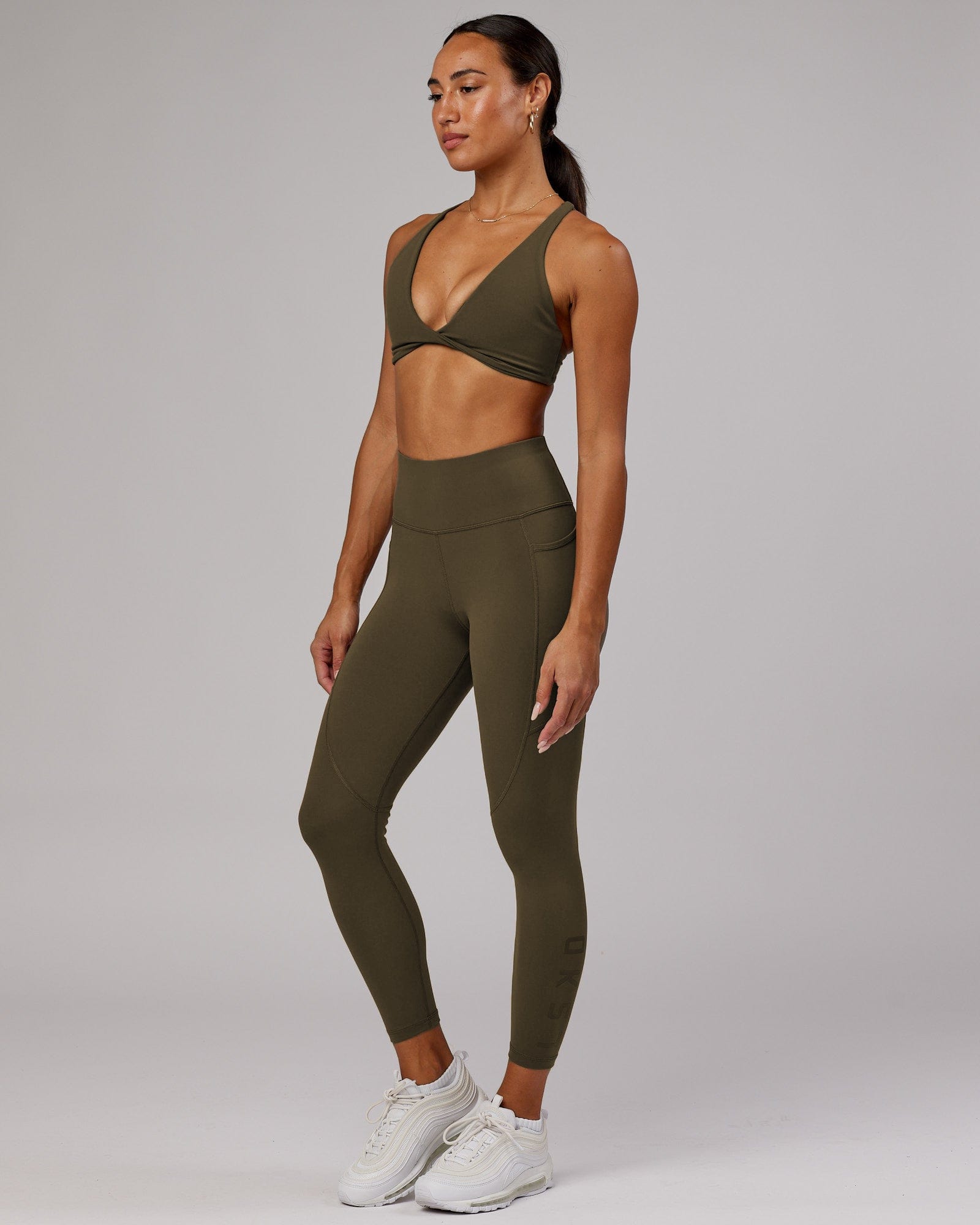 Model wearing Rep 7/8 Length Tight - Army Green