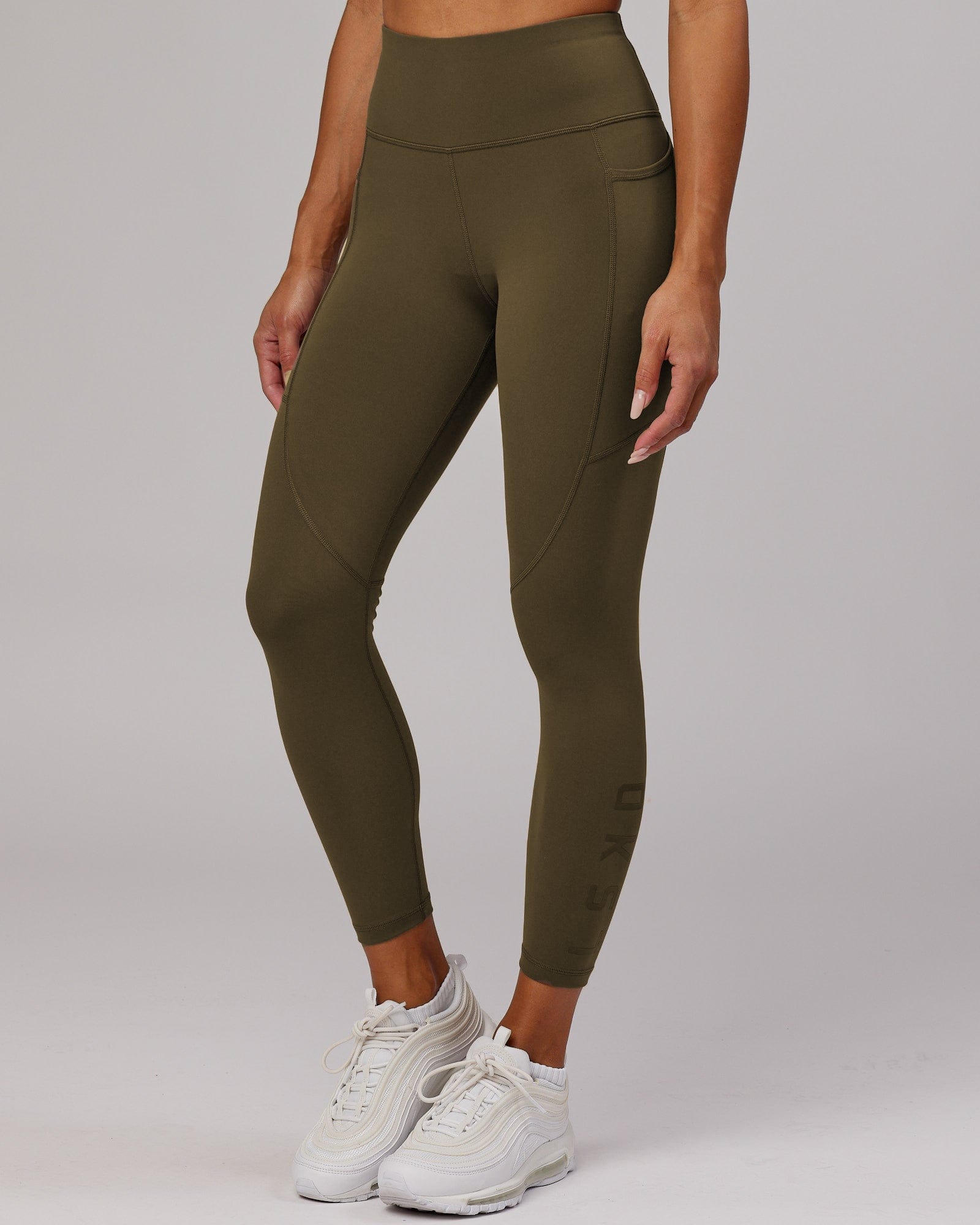 Model wearing Rep 7/8 Length Tight - Army Green