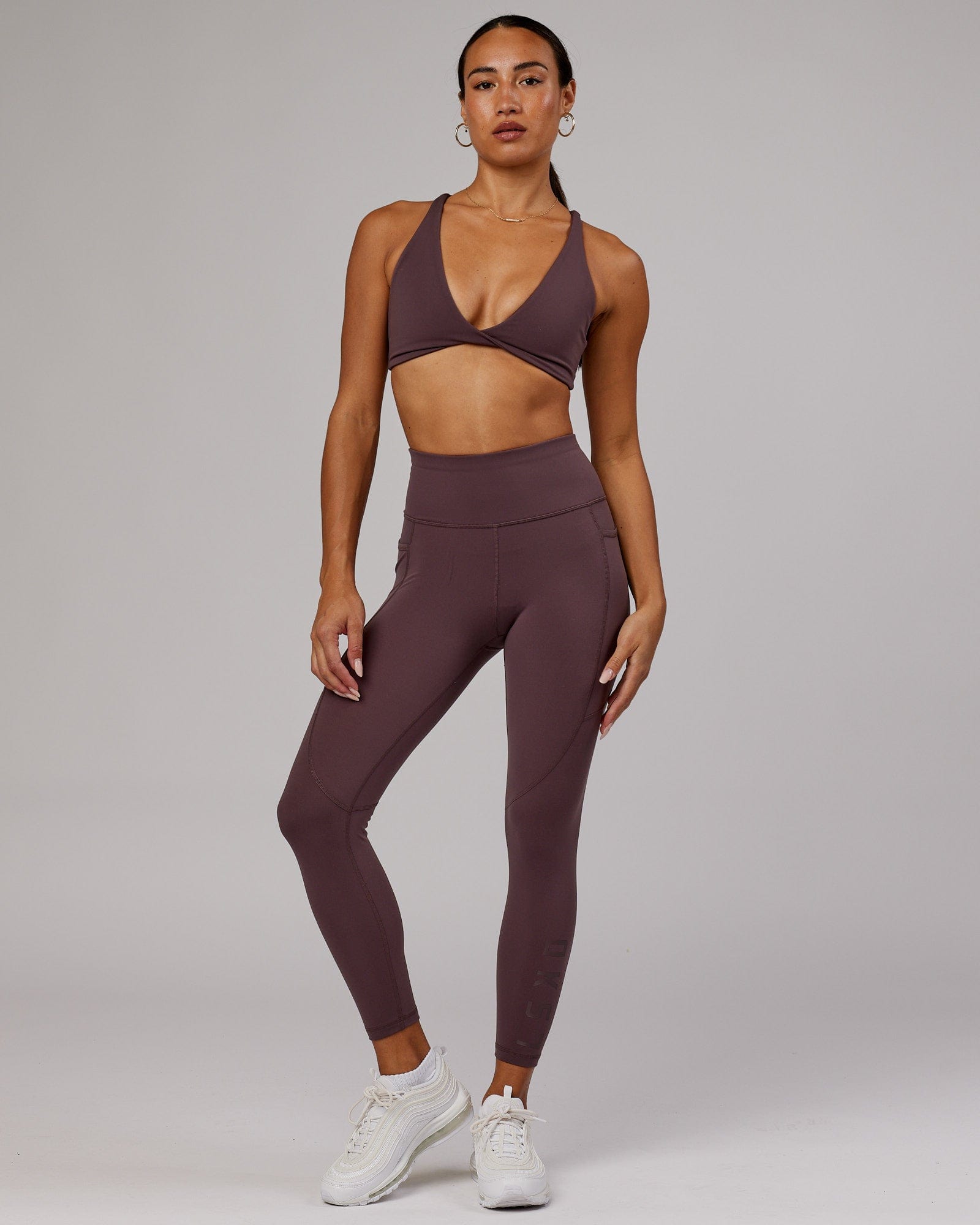 Model wearing Rep 7/8 Length Tight - Plum