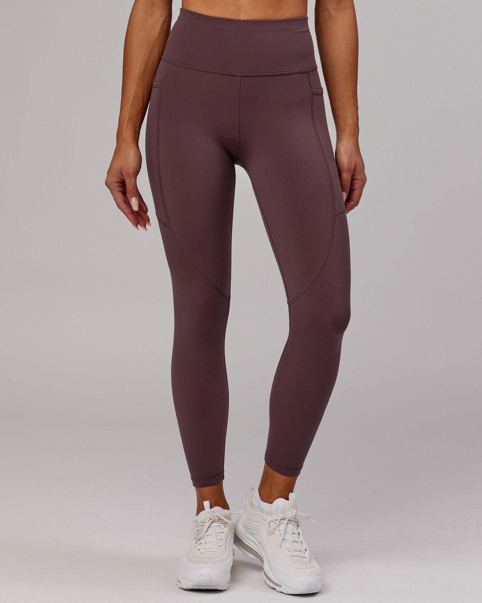 Model wearing Rep 7/8 Length Tight - Plum