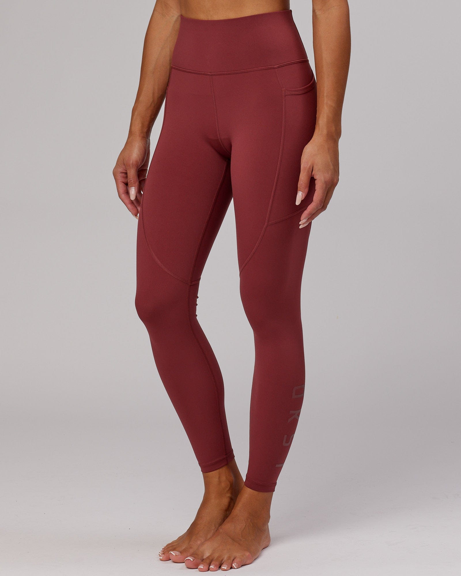 Model wearing Rep Full Length Tight - Apple Berry