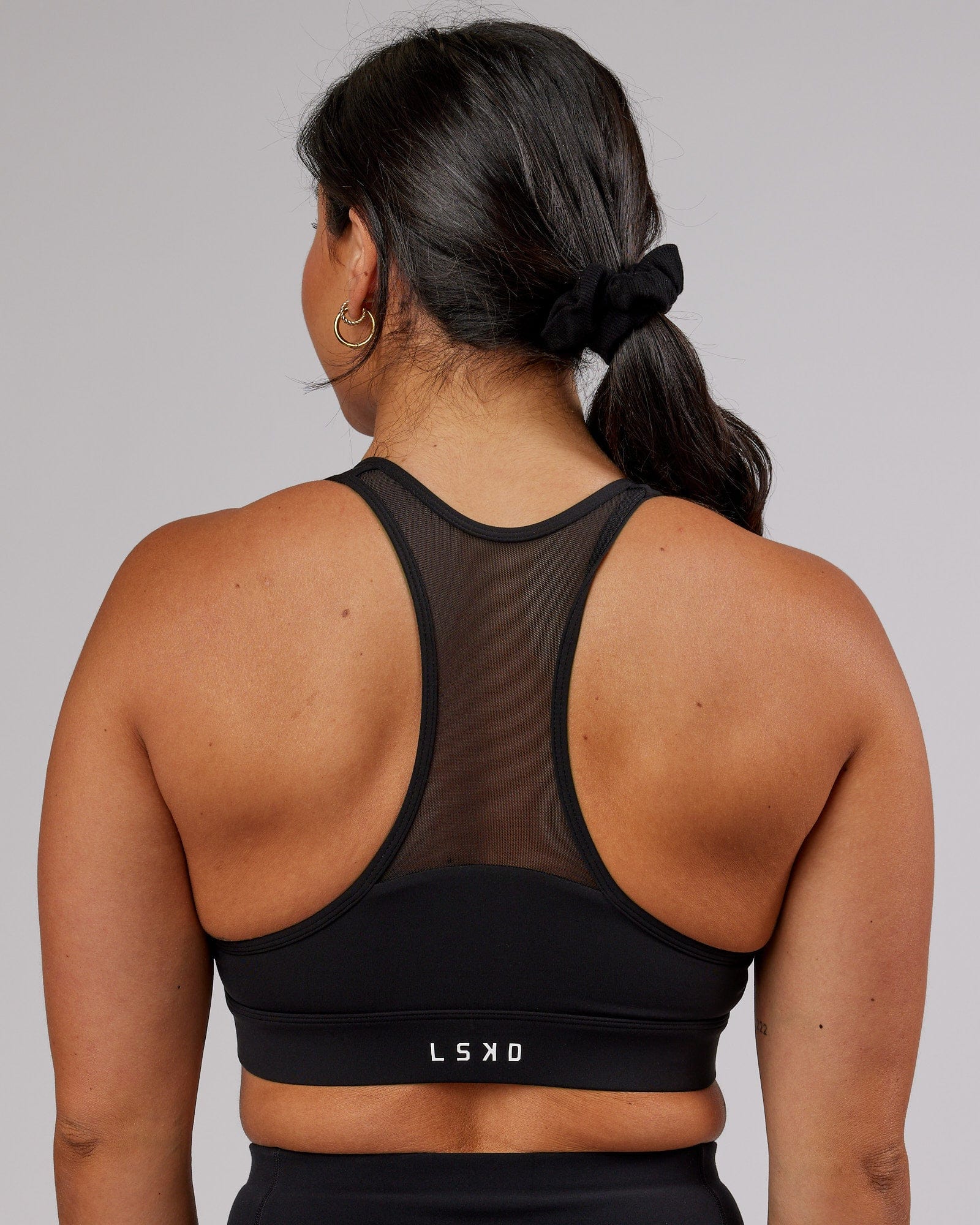 Model wearing Sprint Sports Bra - Black