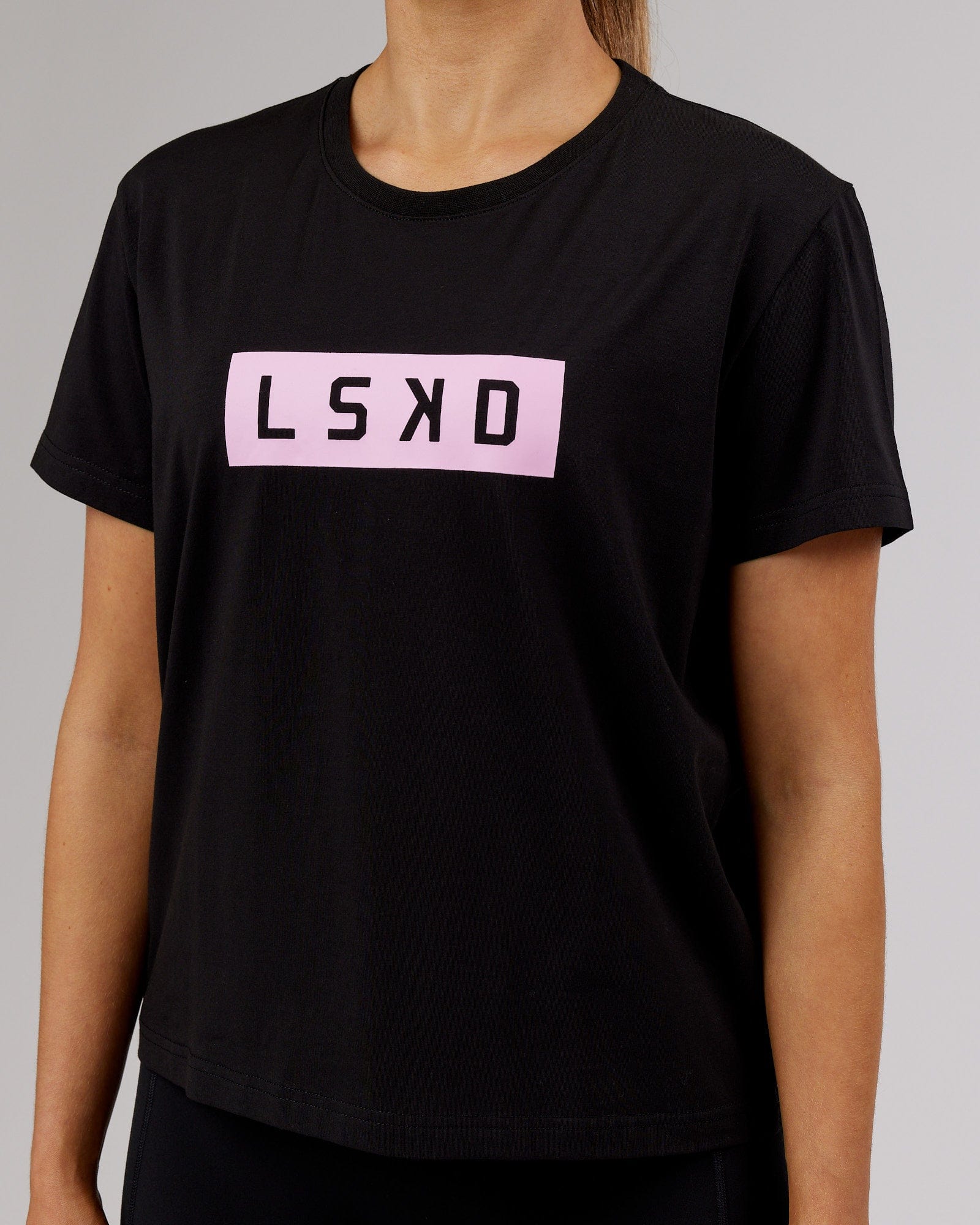 Model wearing Strength FLXCotton Tee - Black-Pink Frosting