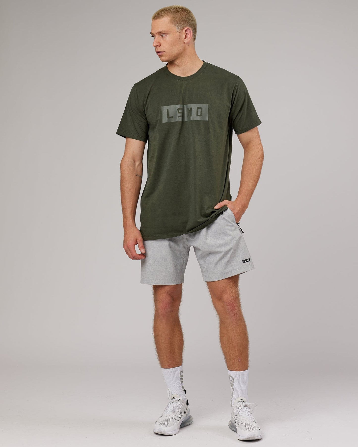 Model wearing Strength FLXDRY Performance Tee - Forest Night