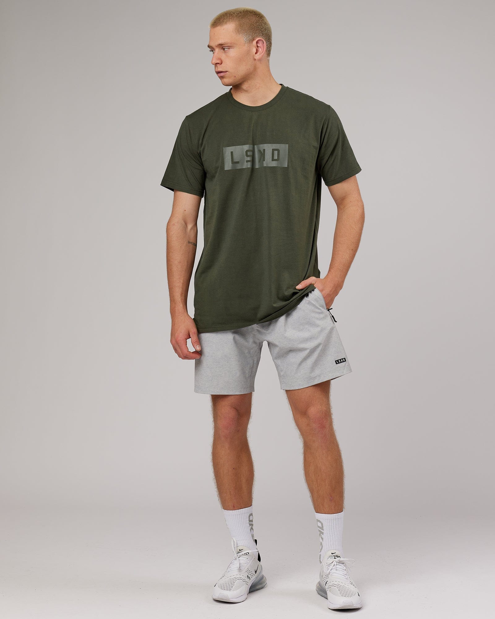 Model wearing Strength FLXDRY Performance Tee - Forest Night