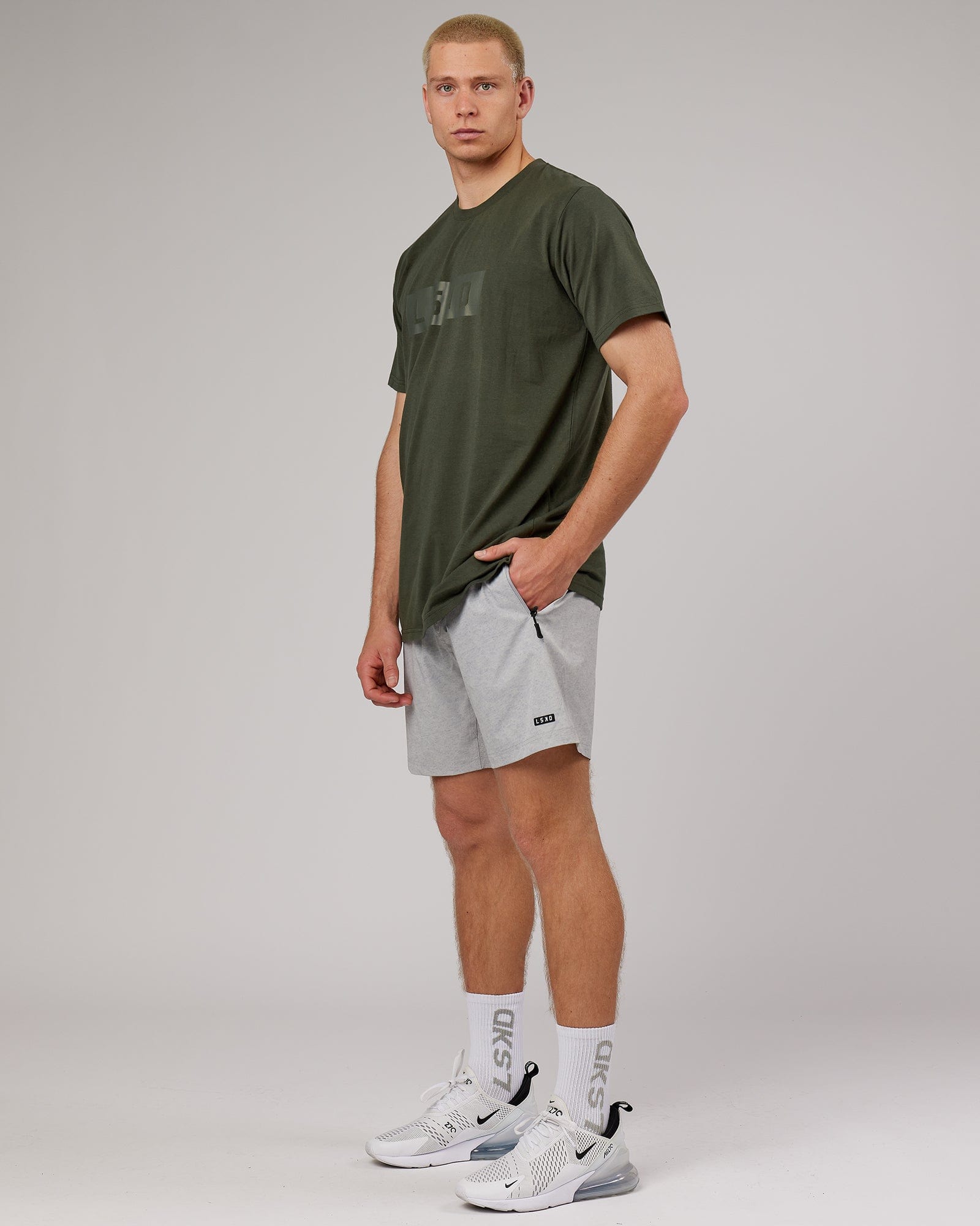 Model wearing Strength FLXDRY Performance Tee - Forest Night