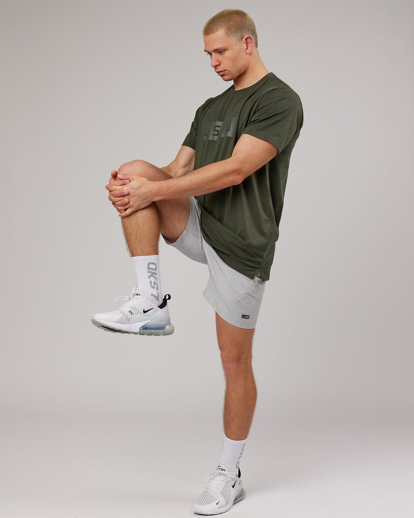 Model wearing Strength FLXDRY Performance Tee - Forest Night