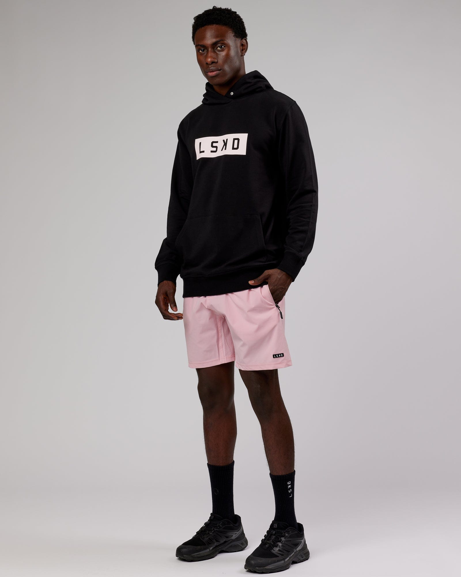Model wearing Strength FLXFleece Hoodie - Black-Pink