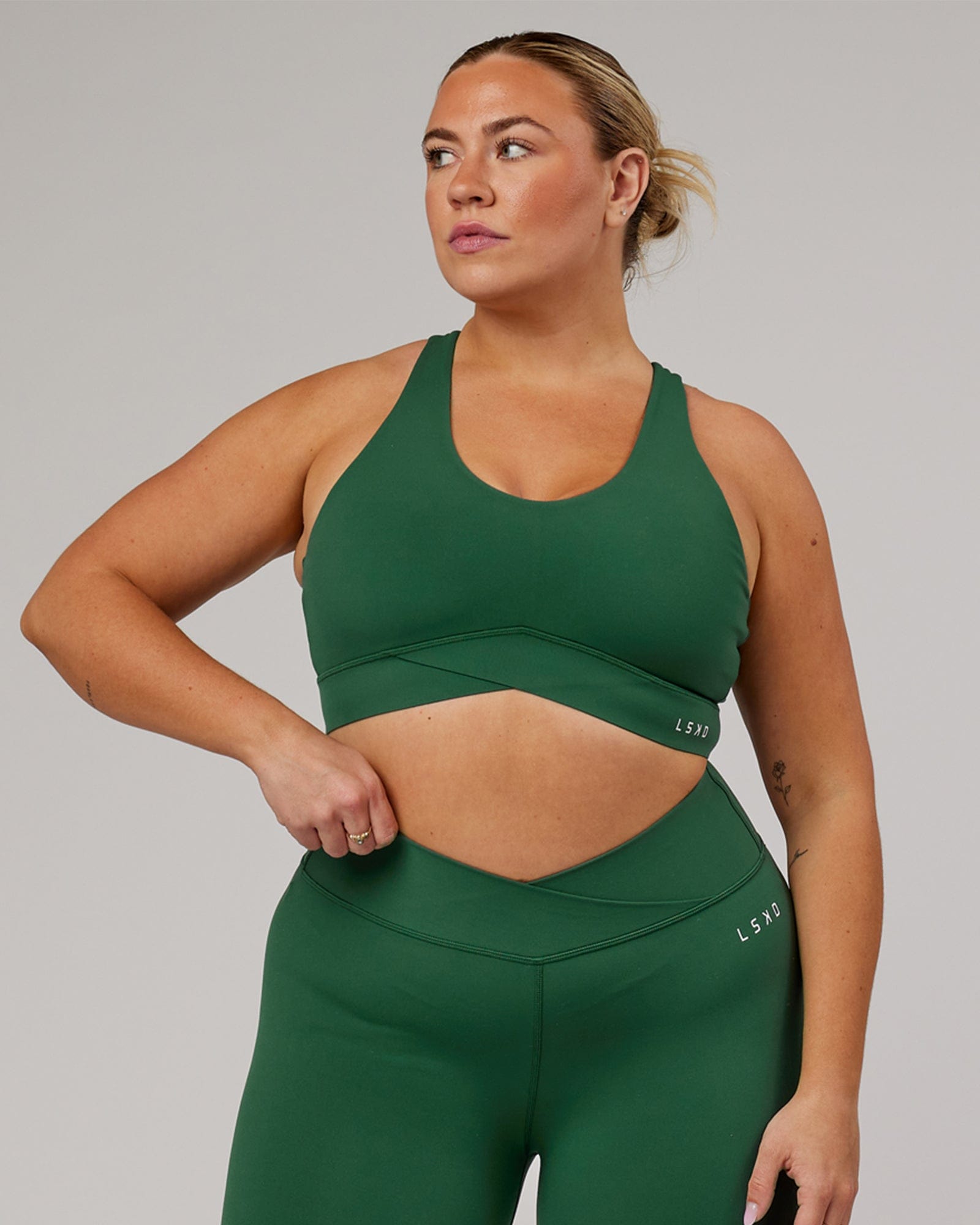 Model wearing Strike Sports Bra - Pineneedle