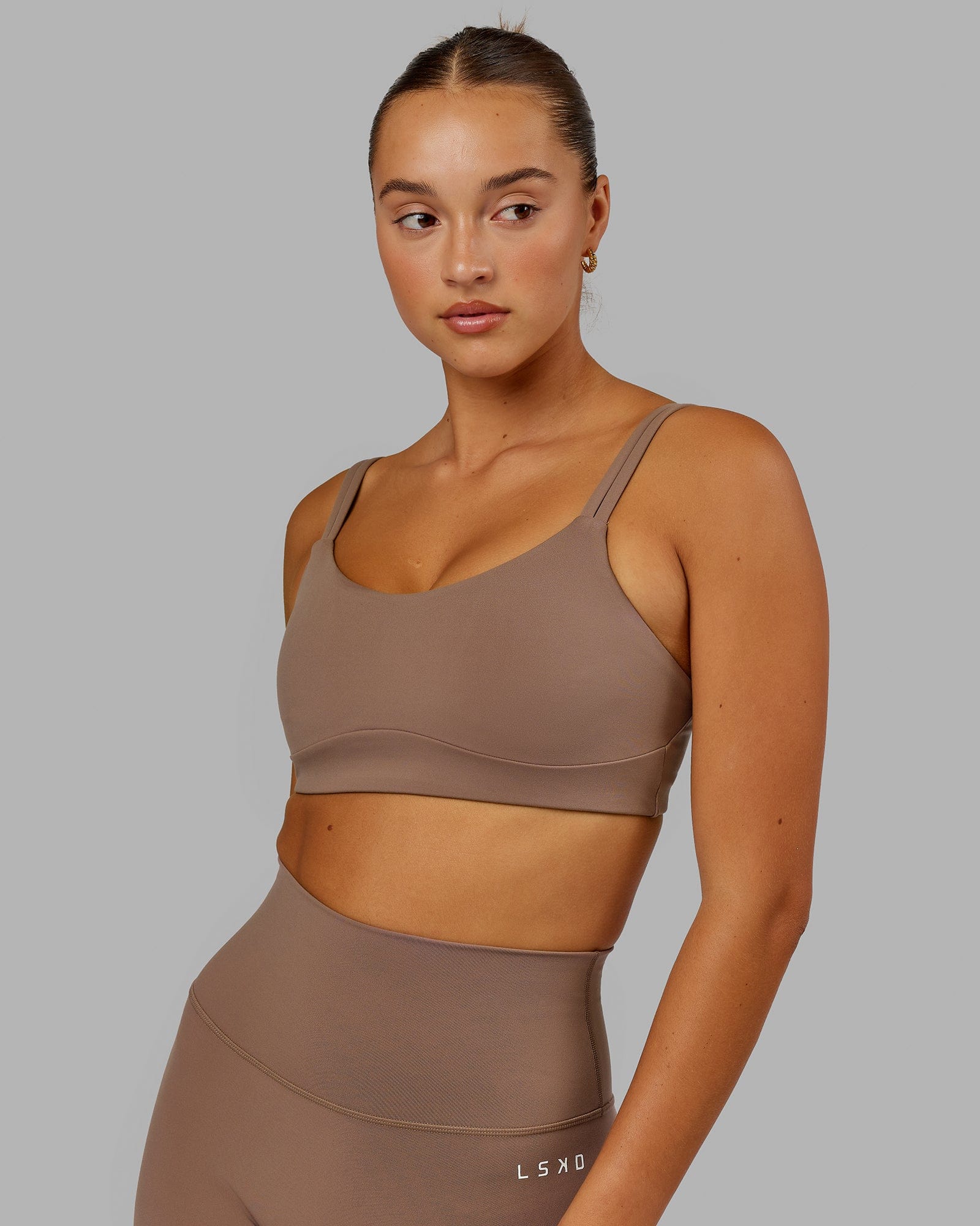 Model wearing Structure Sports Bra - Deep Taupe
