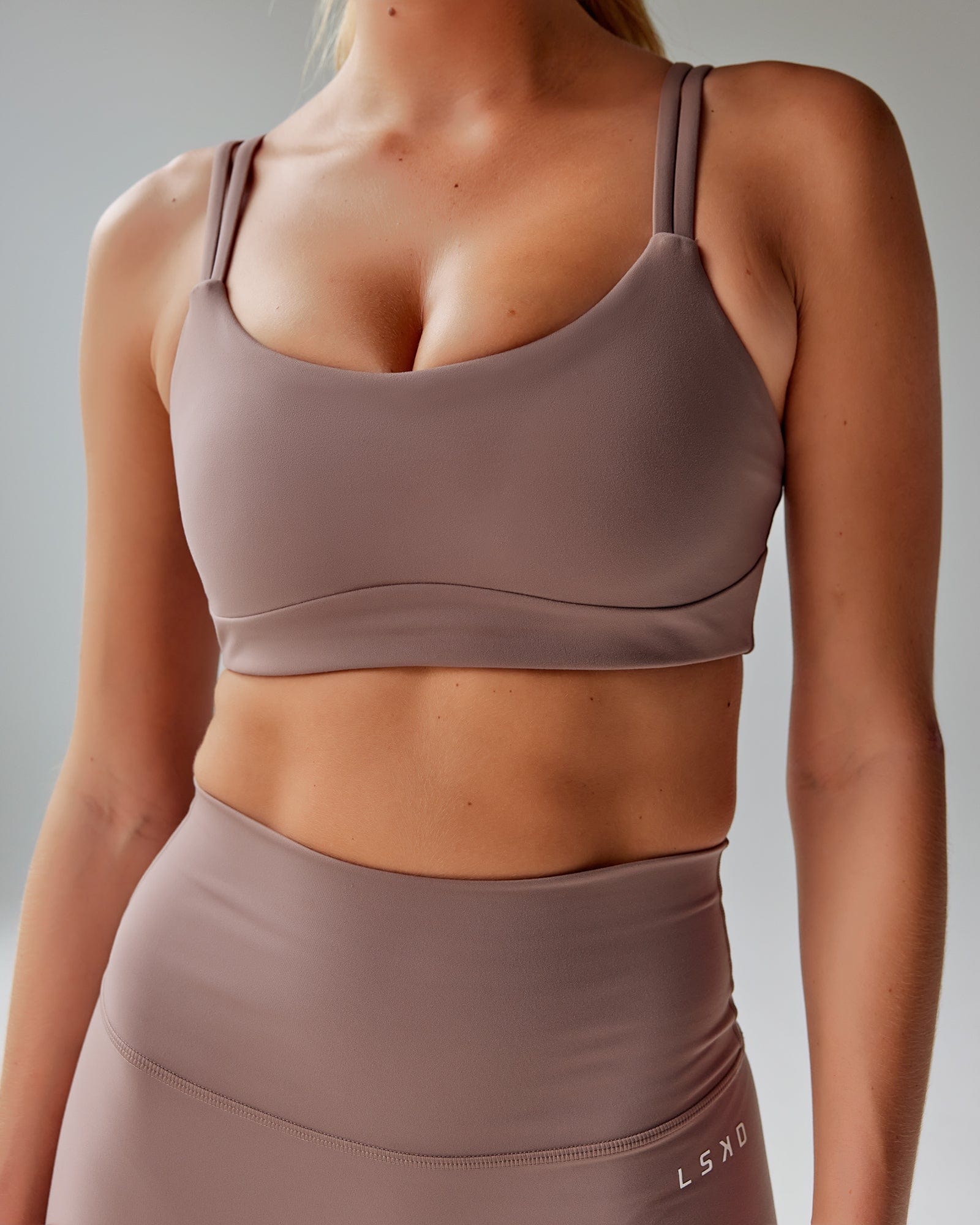 Model wearing Structure Sports Bra - Deep Taupe