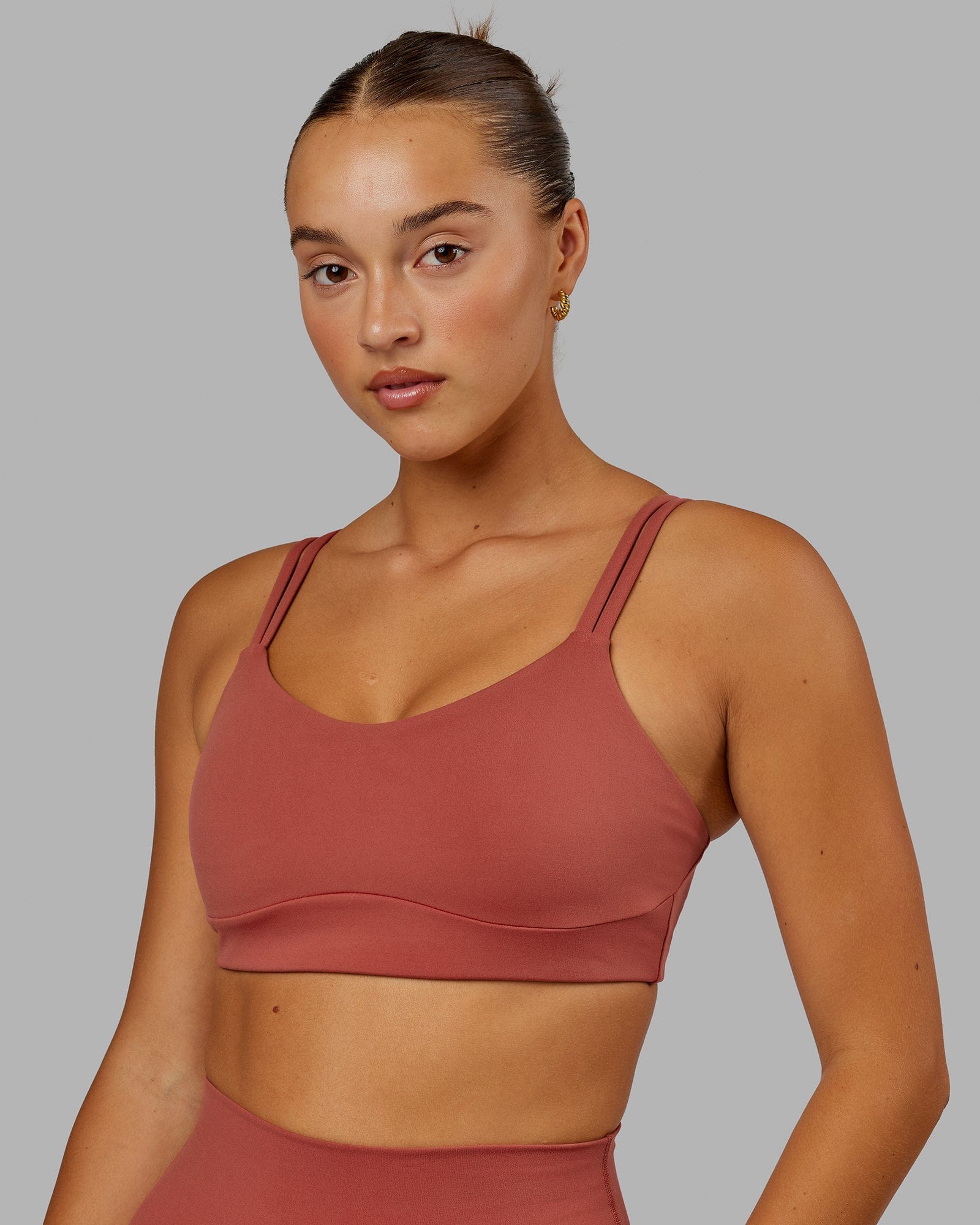 Model wearing Structure Sports Bra - Paprika
