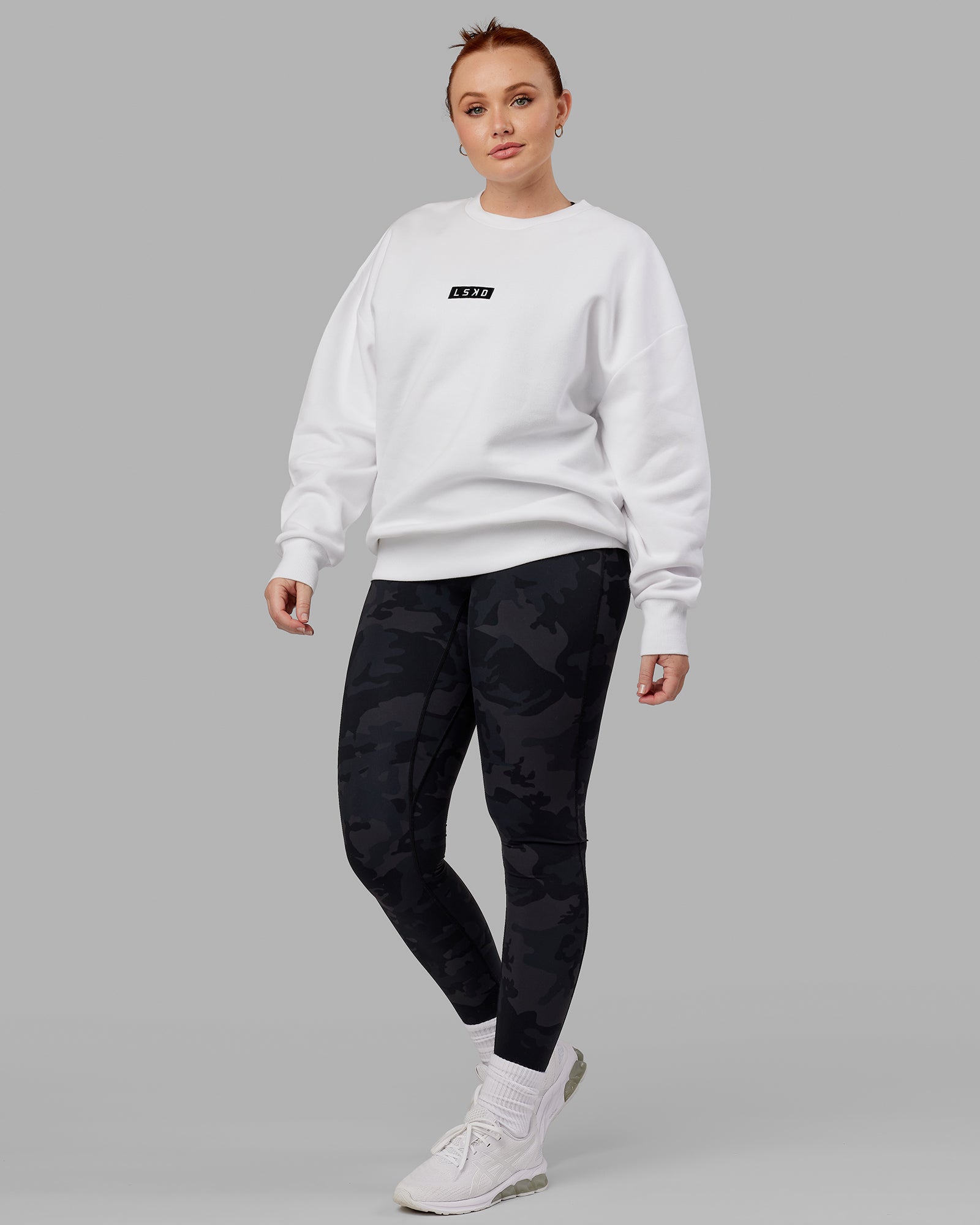Model wearing Unisex Cornerstone Sweater Oversize - White