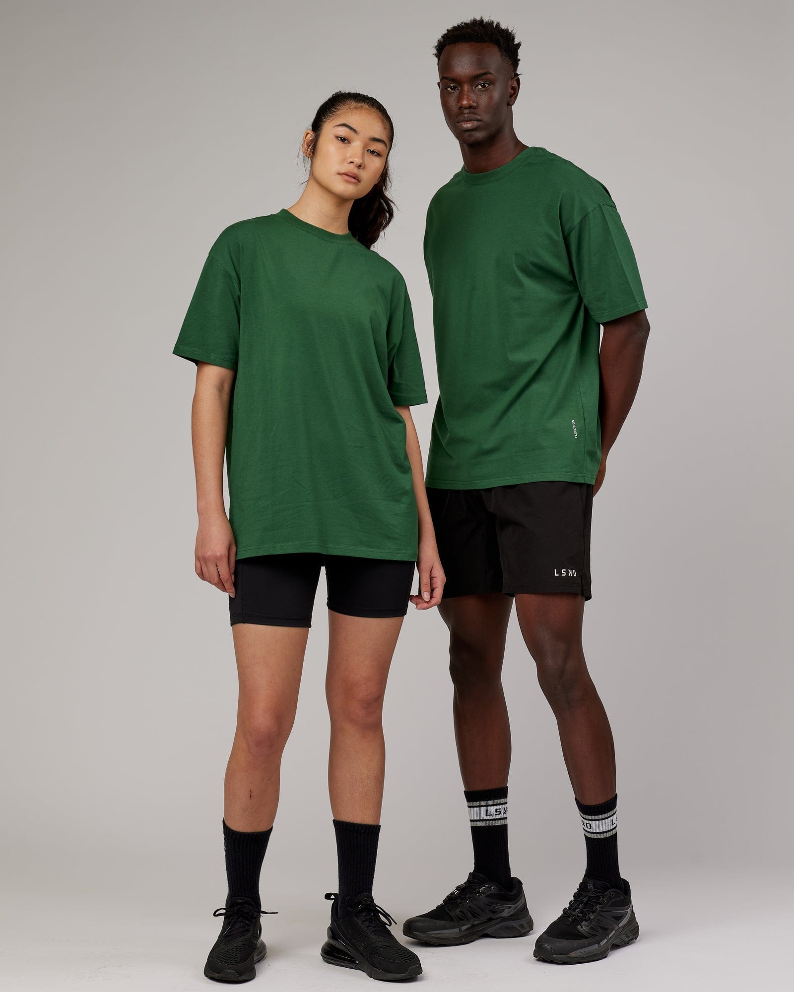 Model wearing Unisex DownLow FLXCotton Oversize Tee - Pineneedle