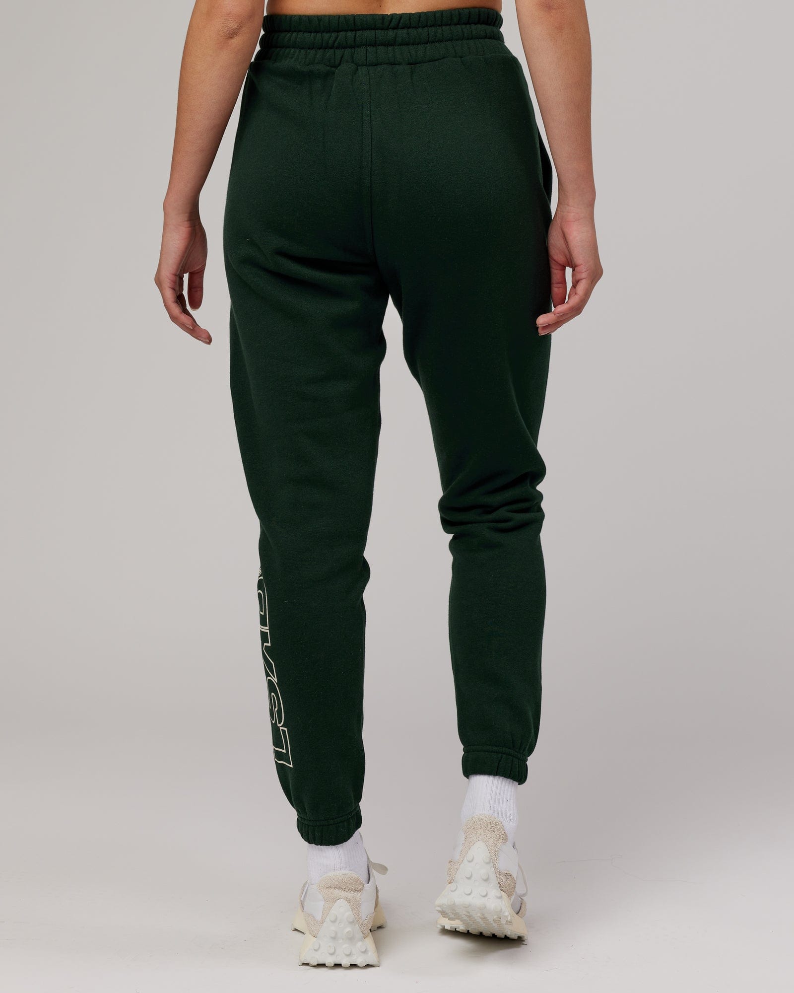 Model wearing Unisex Stacks Up Track Pant - Forest
