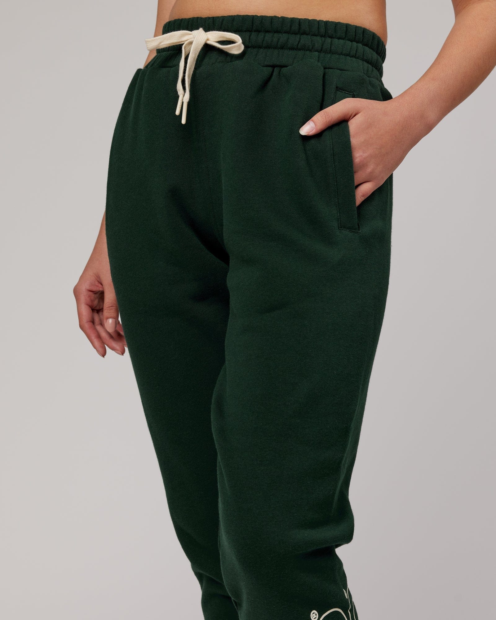 Model wearing Unisex Stacks Up Track Pant - Forest