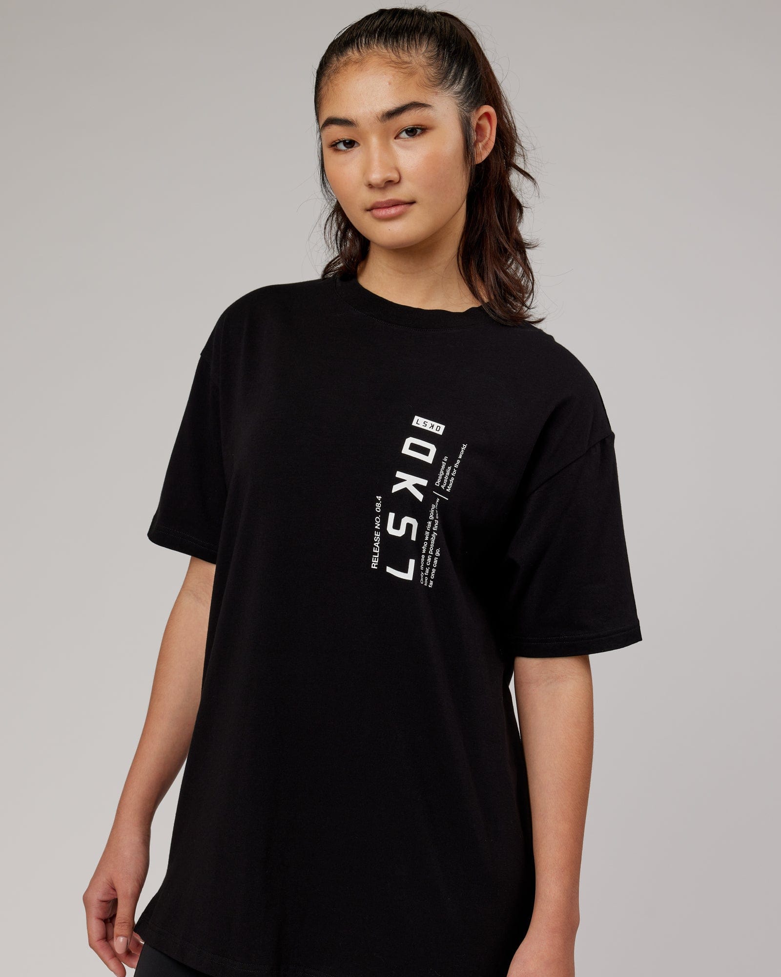 Model wearing Upright FLXCotton Tee Oversize - Black