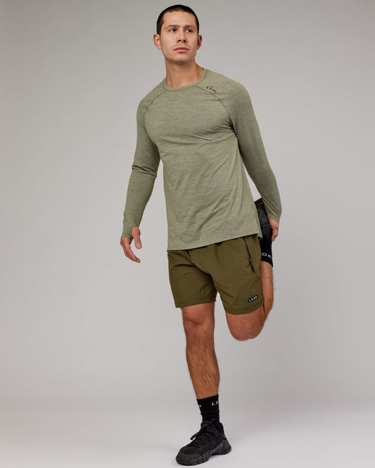 Model wearing Perform VapourFLX LS Tee - Olive Marl