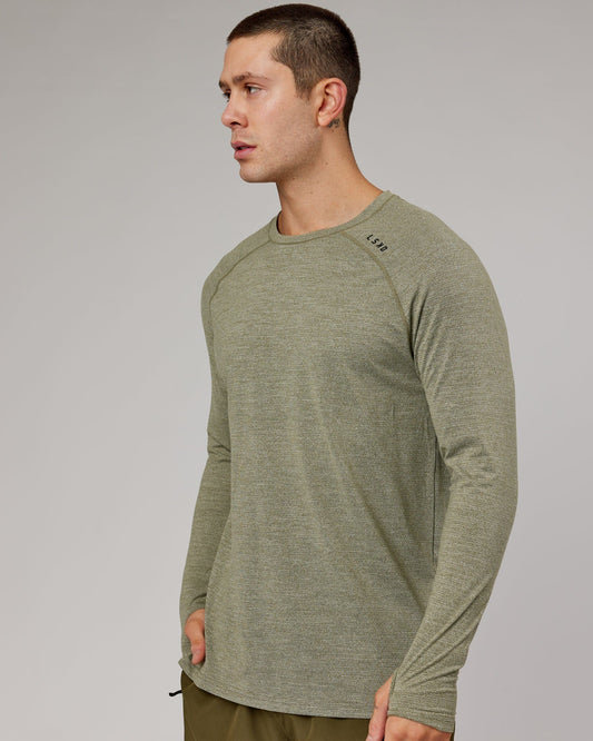 Model wearing Perform VapourFLX LS Tee - Olive Marl