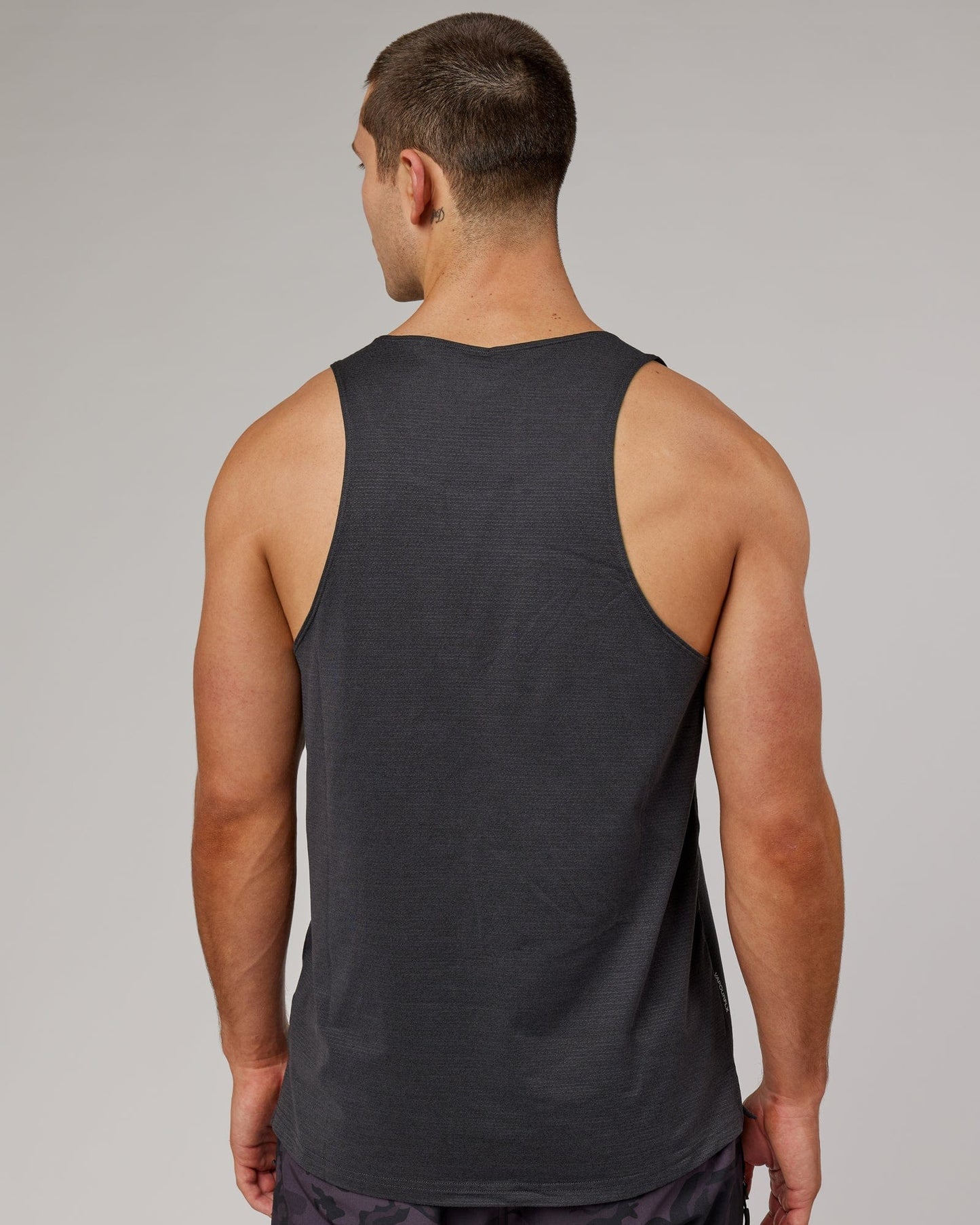Model wearing Perform VapourFLX Tank - Black Marl