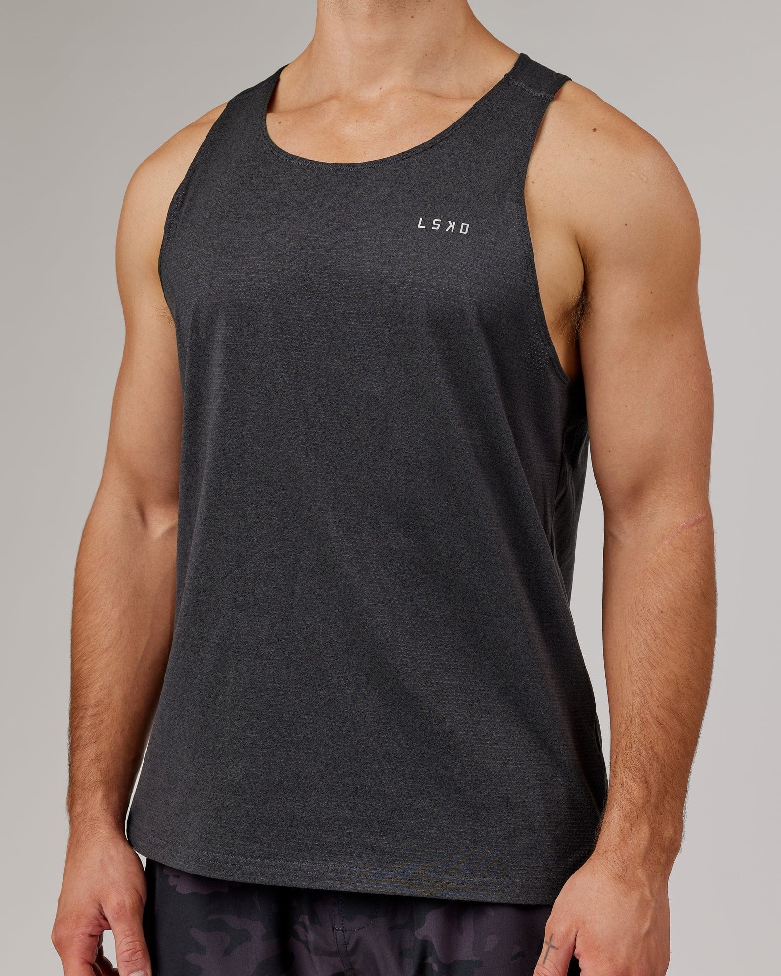 Model wearing Perform VapourFLX Tank - Black Marl