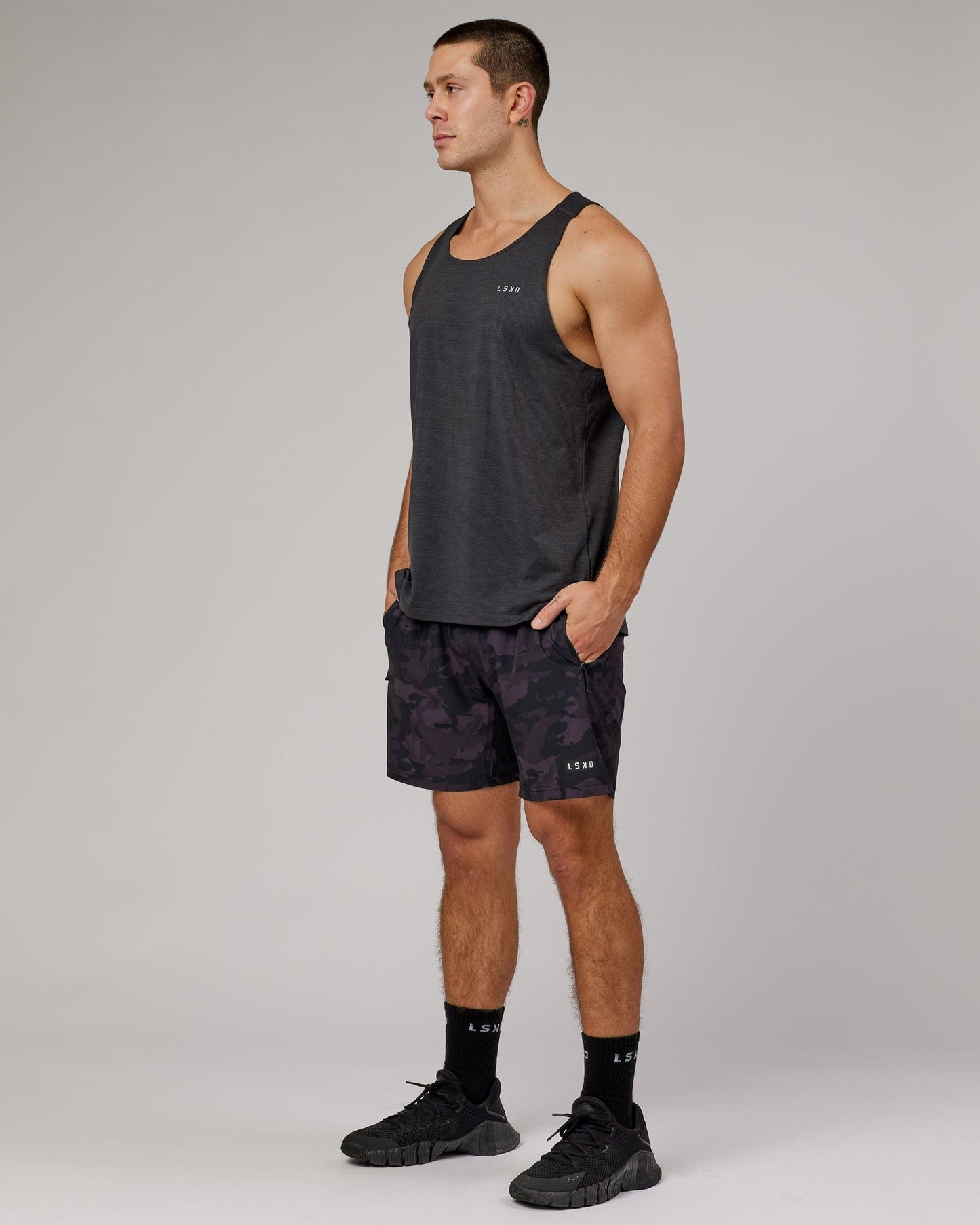 Model wearing Perform VapourFLX Tank - Black Marl