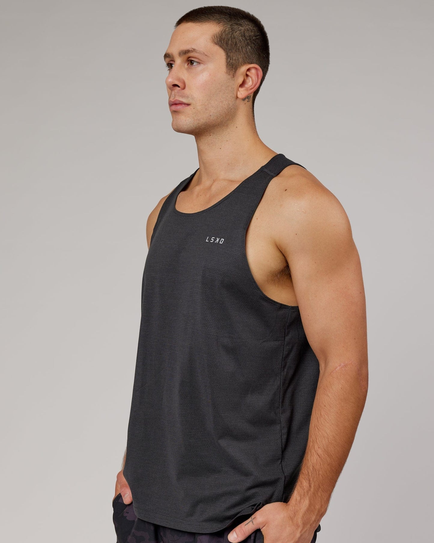 Model wearing Perform VapourFLX Tank - Black Marl