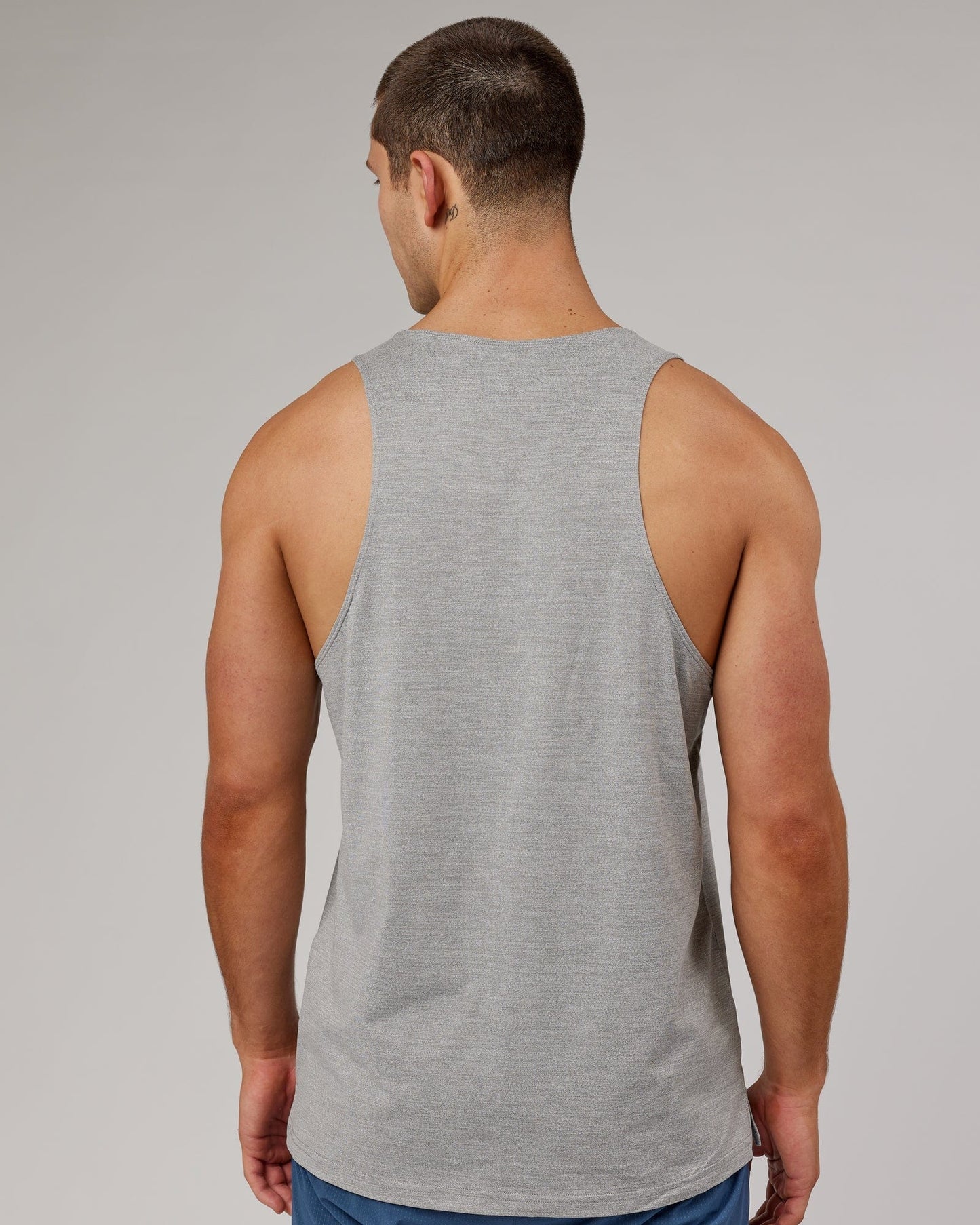 Model wearing Perform VapourFLX Tank - Lt Grey Marl