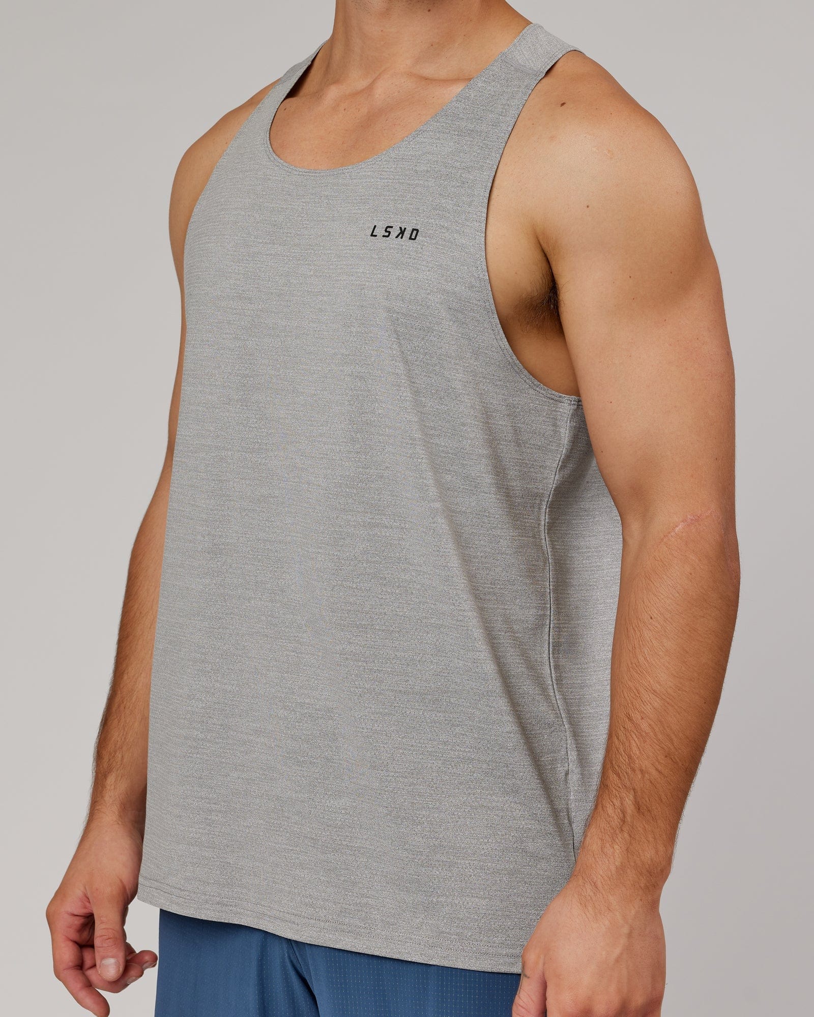 Model wearing Perform VapourFLX Tank - Lt Grey Marl