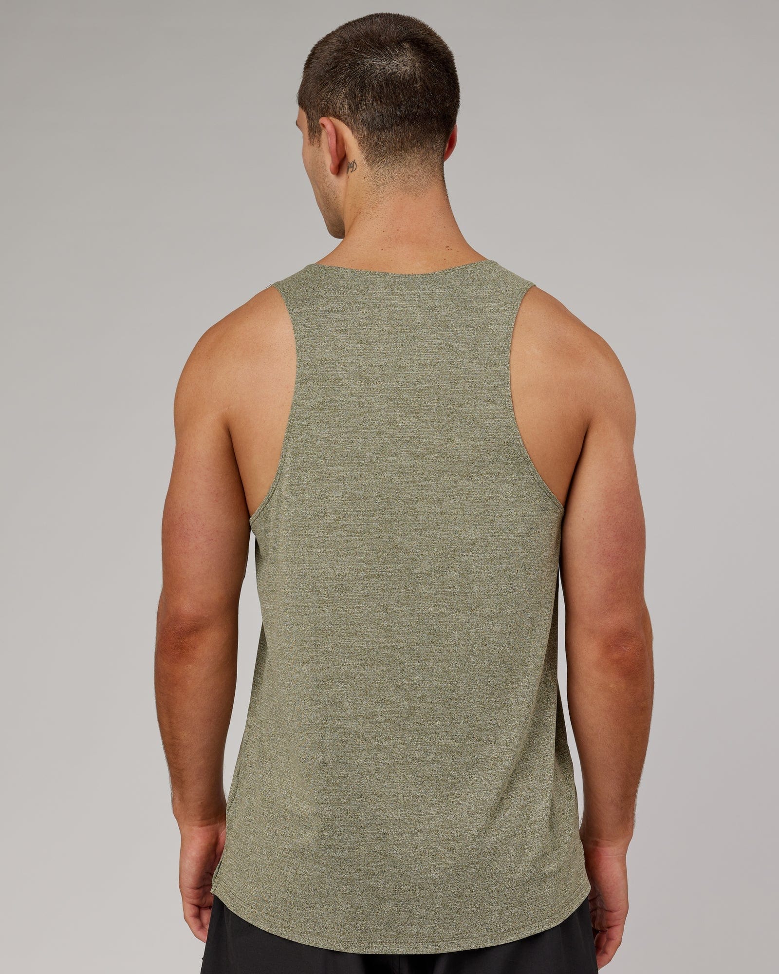 Model wearing Perform VapourFLX Tank - Olive Marl