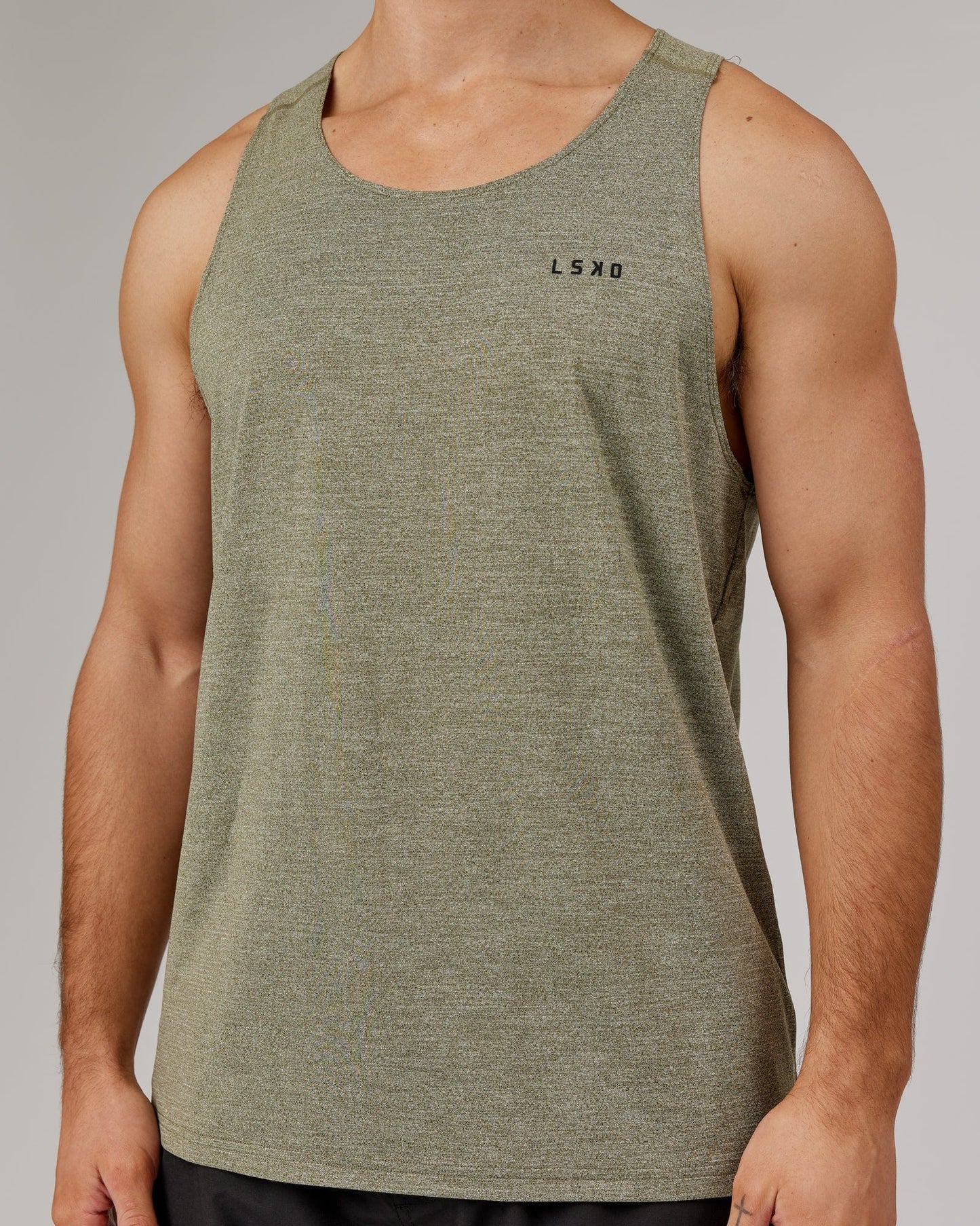 Model wearing Perform VapourFLX Tank - Olive Marl