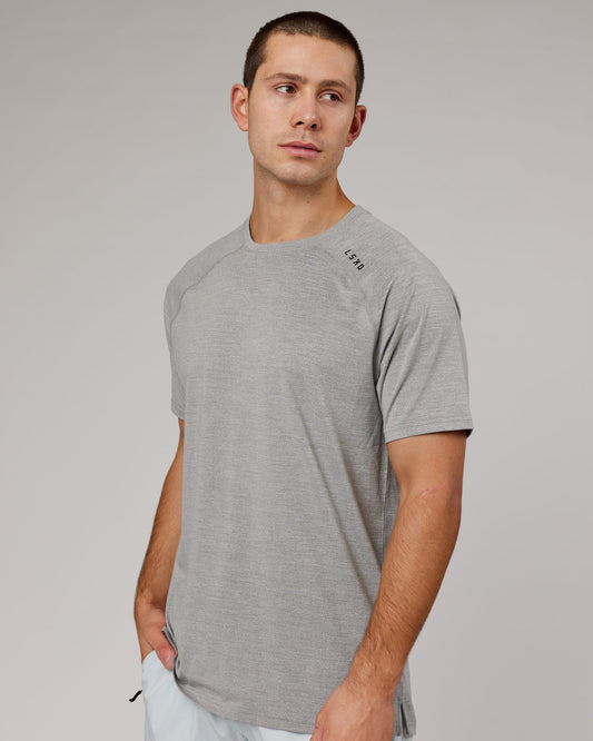 Model wearing Perform VapourFLX Tee - Lt Grey Marl