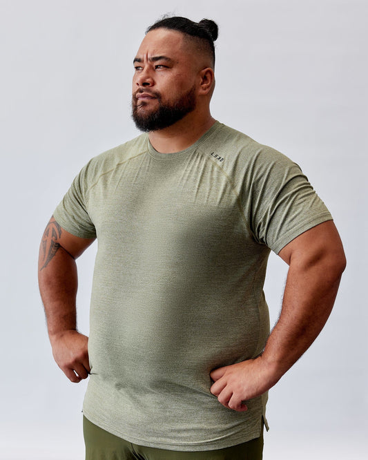 Model wearing Perform VapourFLX Tee - Olive Marl